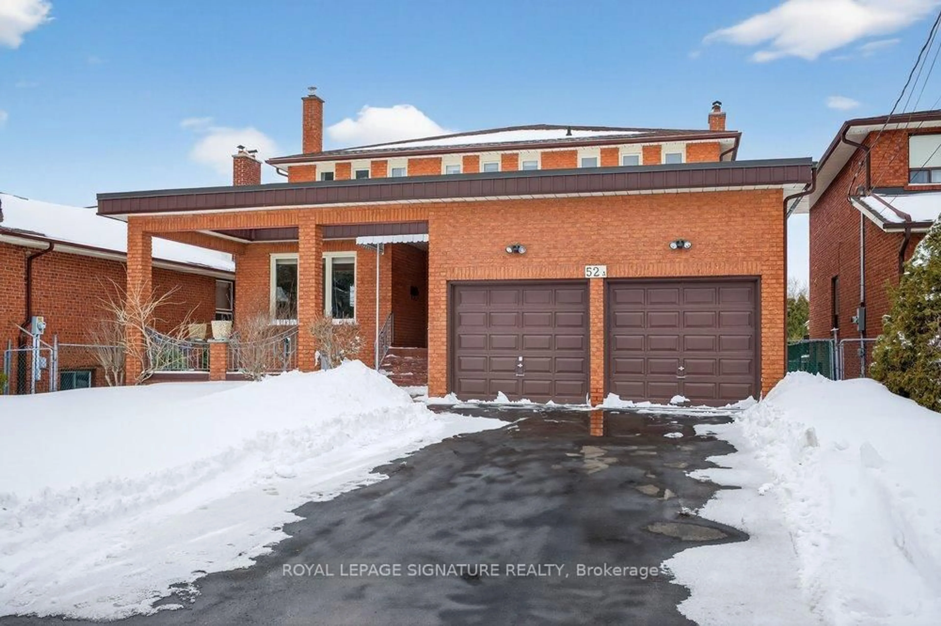 Home with brick exterior material, street for 52A Gooderham Dr, Toronto Ontario M1R 3G7