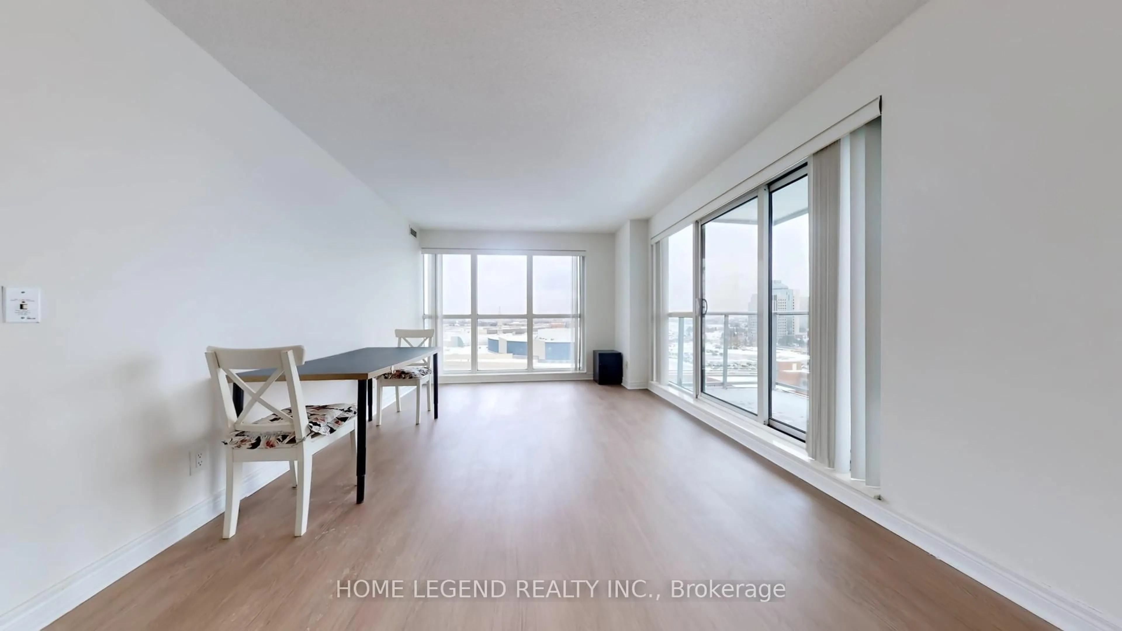 Living room with furniture, wood/laminate floor for 70 Town Centre Crt #1002, Toronto Ontario M1P 0B2