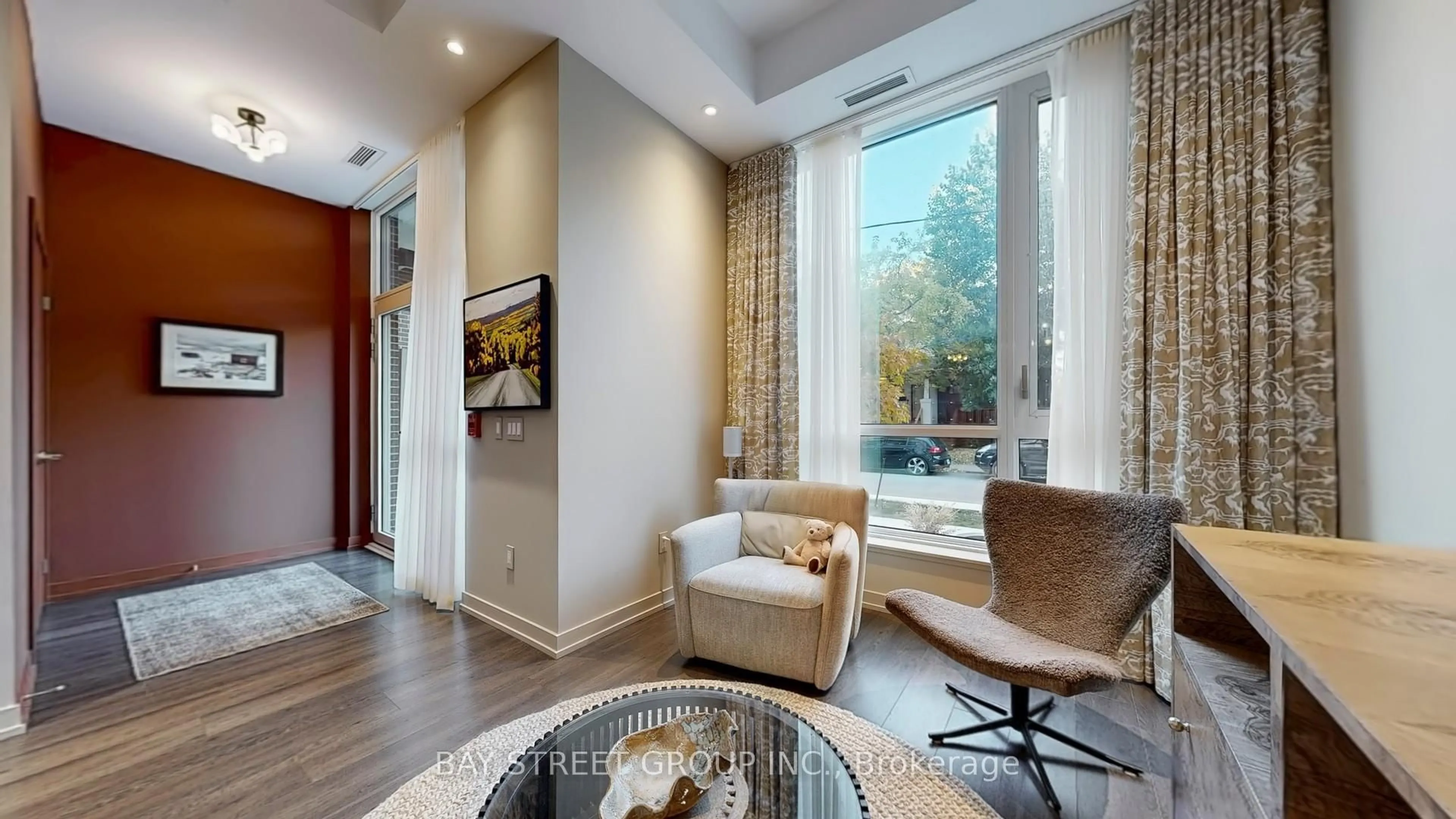 Living room with furniture, unknown for 150 Logan Ave #105, Toronto Ontario M4M 0E4