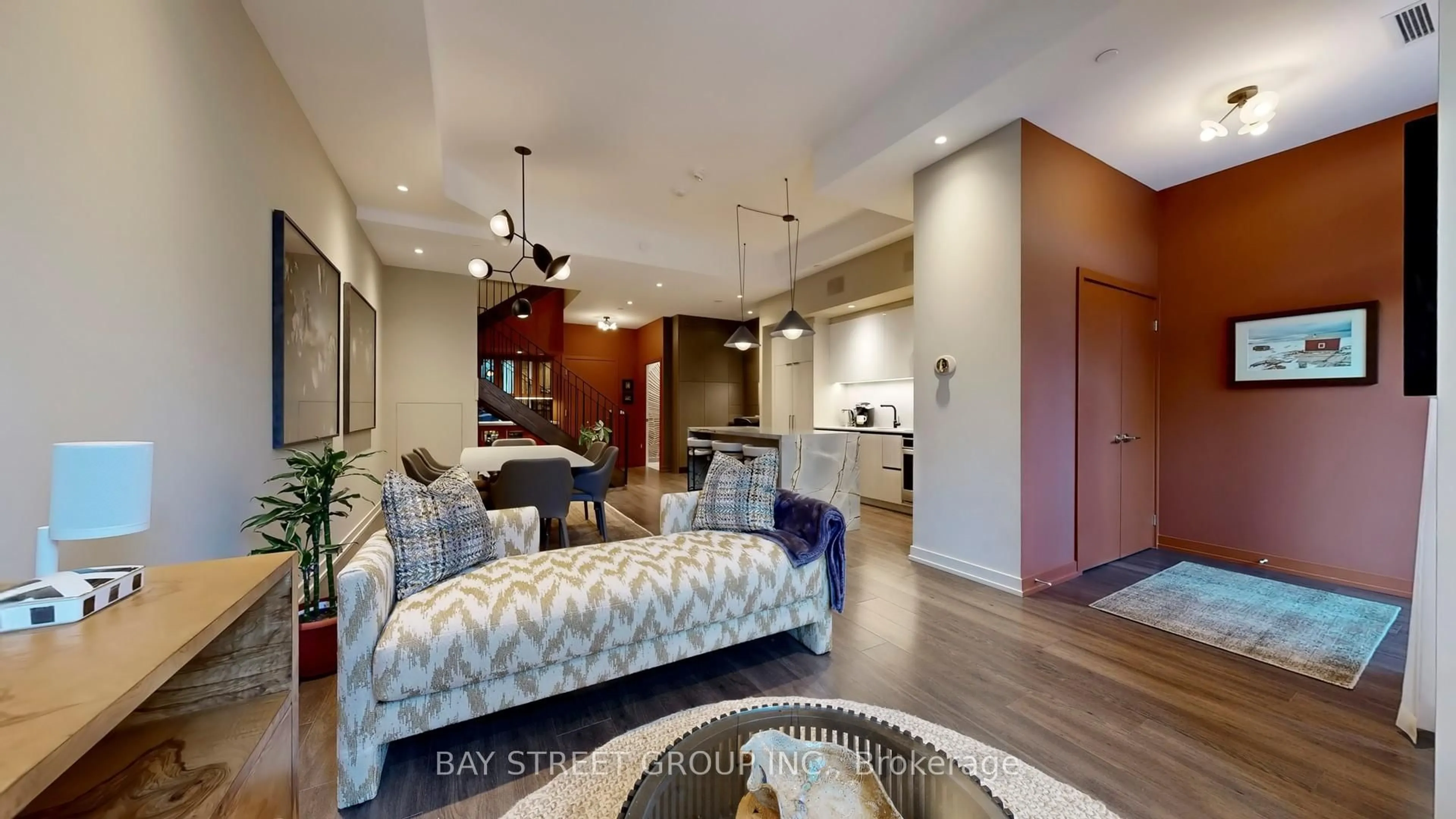 Living room with furniture, unknown for 150 Logan Ave #105, Toronto Ontario M4M 0E4