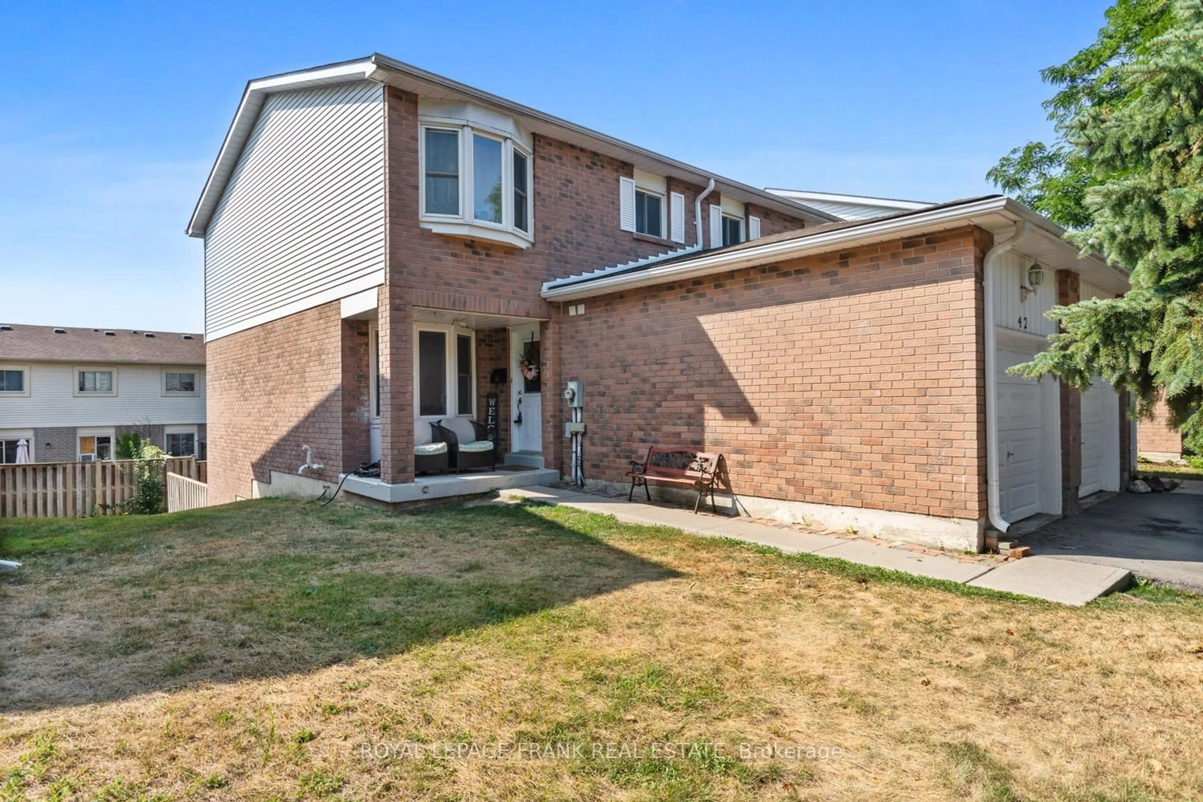 Home with brick exterior material, street for 700 Harmony Rd #42, Oshawa Ontario L1K 1S2
