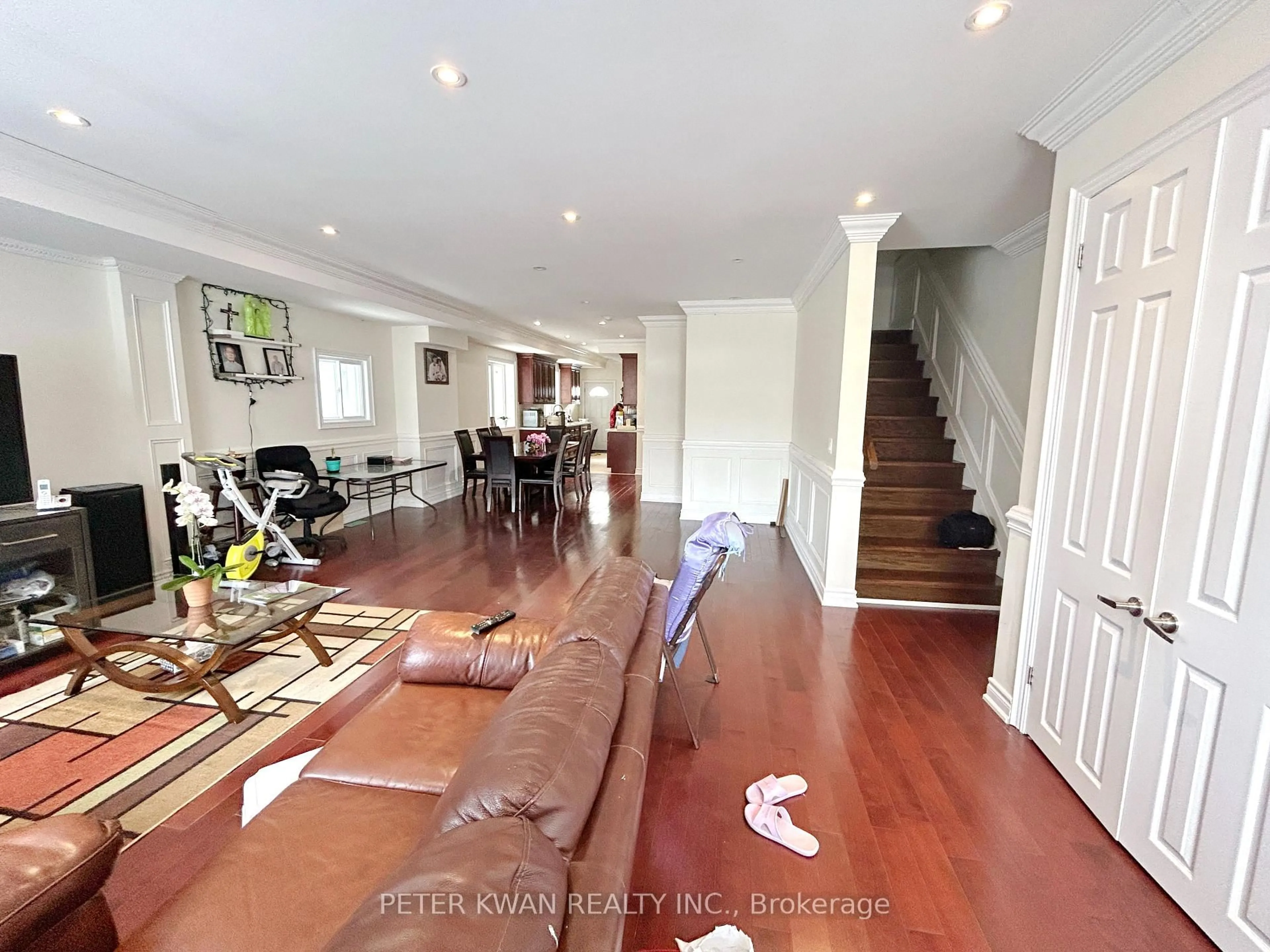 Dining room, wood/laminate floor for 1543 Dundas St, Toronto Ontario M4L 1K6