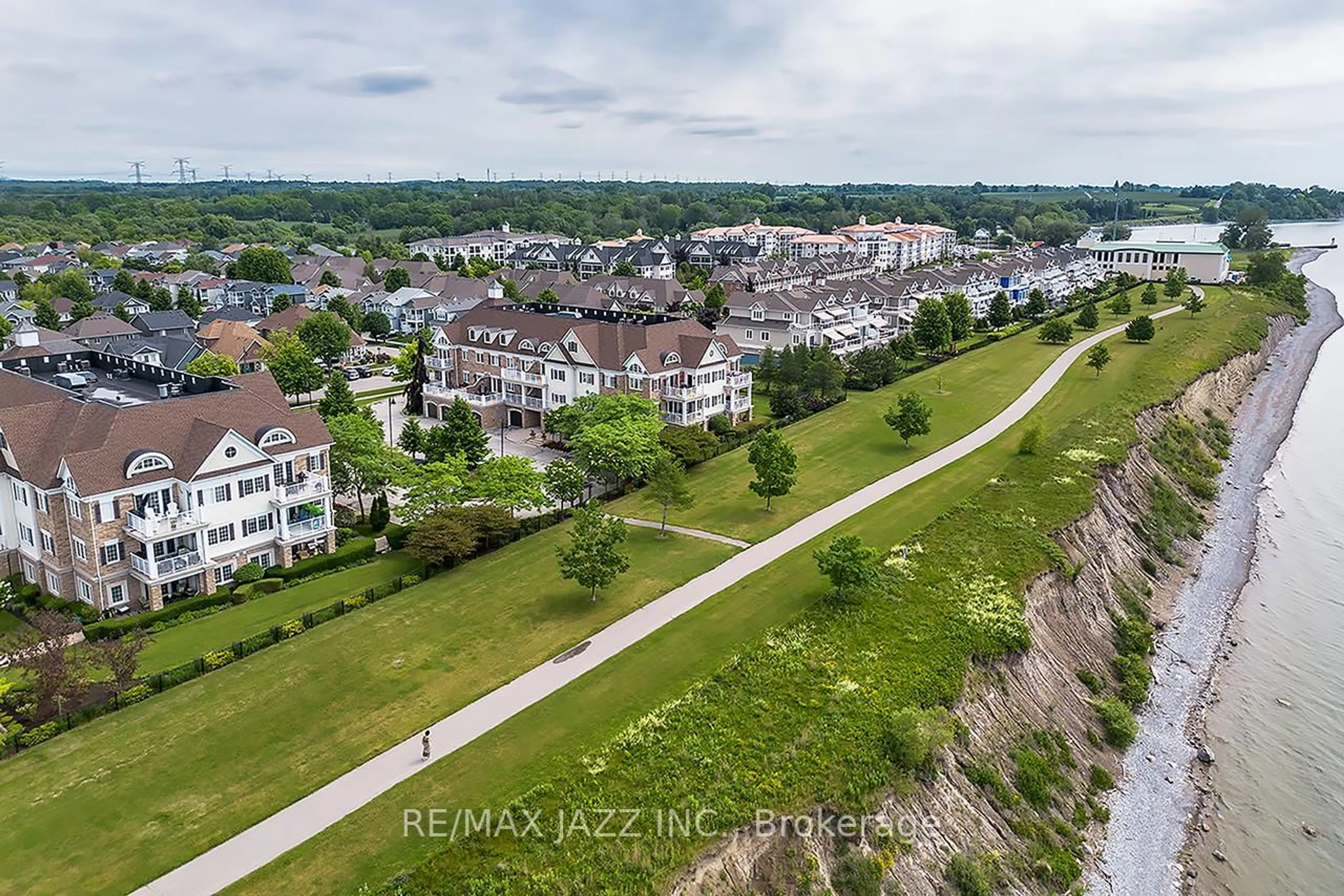 A pic from outside/outdoor area/front of a property/back of a property/a pic from drone, unknown for 375 Lakebreeze Dr #102, Clarington Ontario L1B 0A3