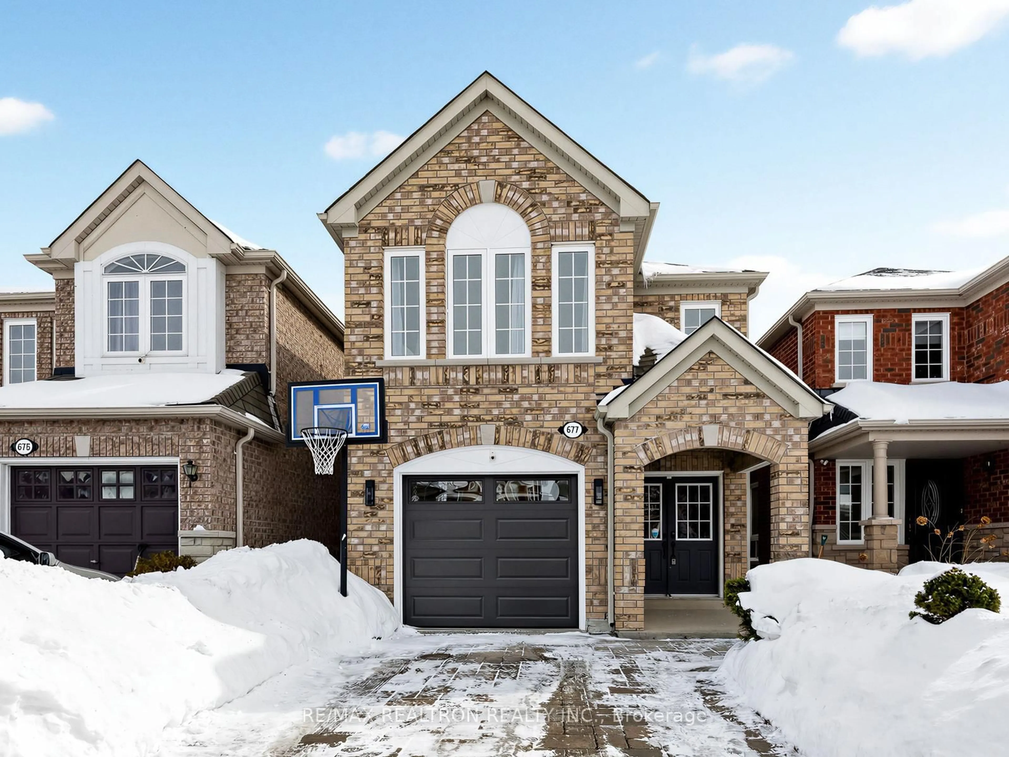 Home with brick exterior material, street for 677 Sunbird Tr, Pickering Ontario L1X 2X6