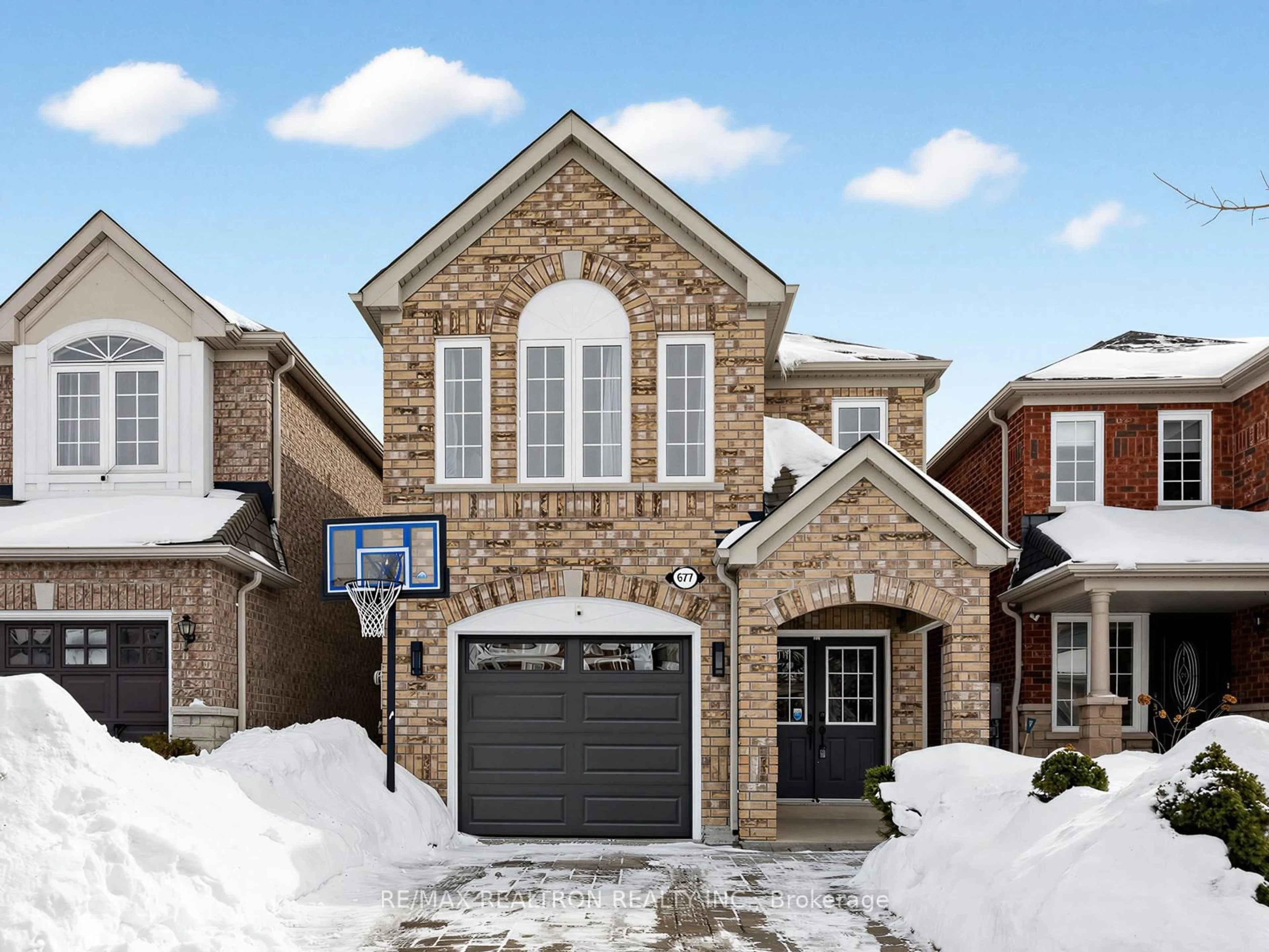 Home with brick exterior material, street for 677 Sunbird Tr, Pickering Ontario L1X 2X6