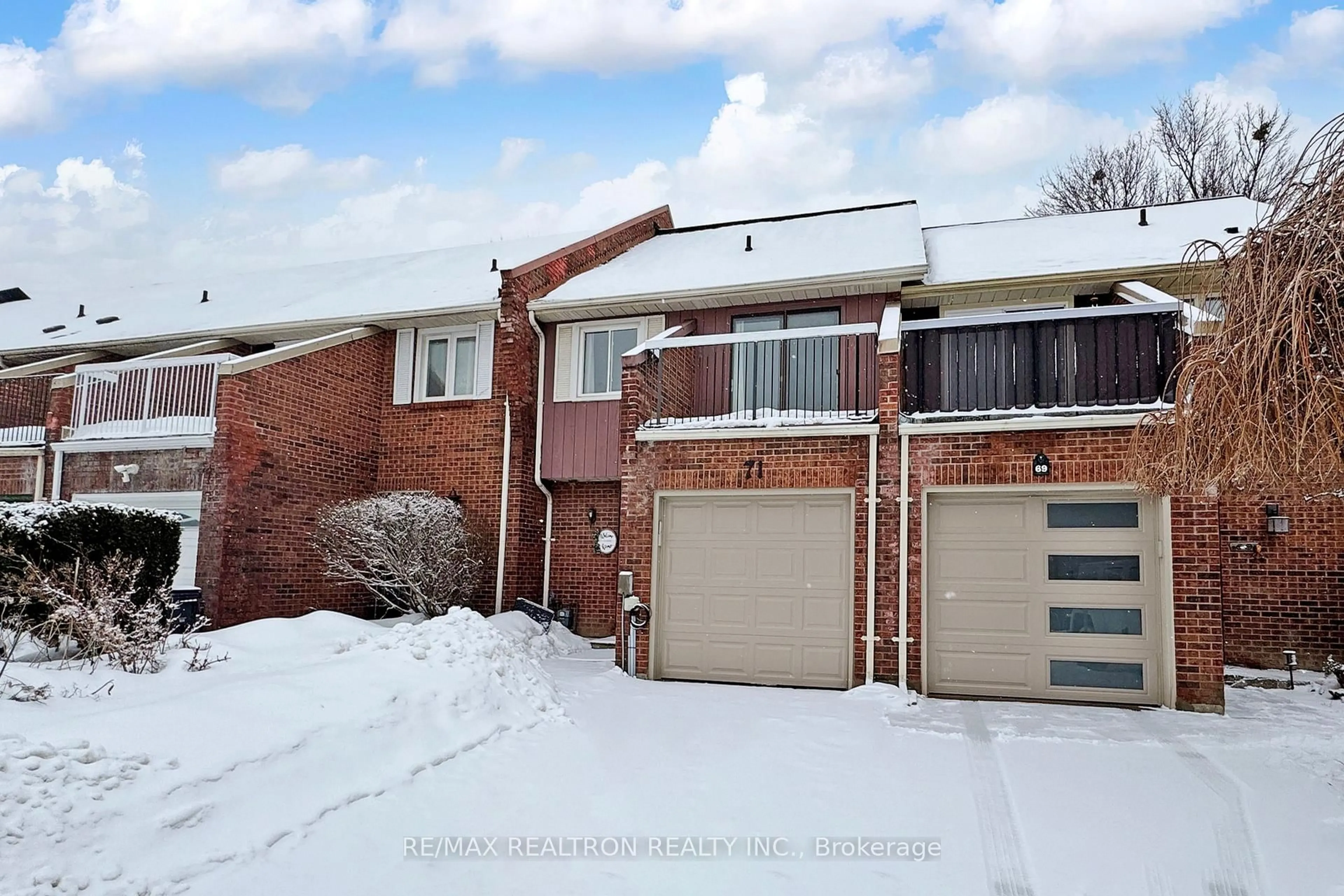 Home with brick exterior material, street for 71 Ecclesfield Dr, Toronto Ontario M1W 2Y3
