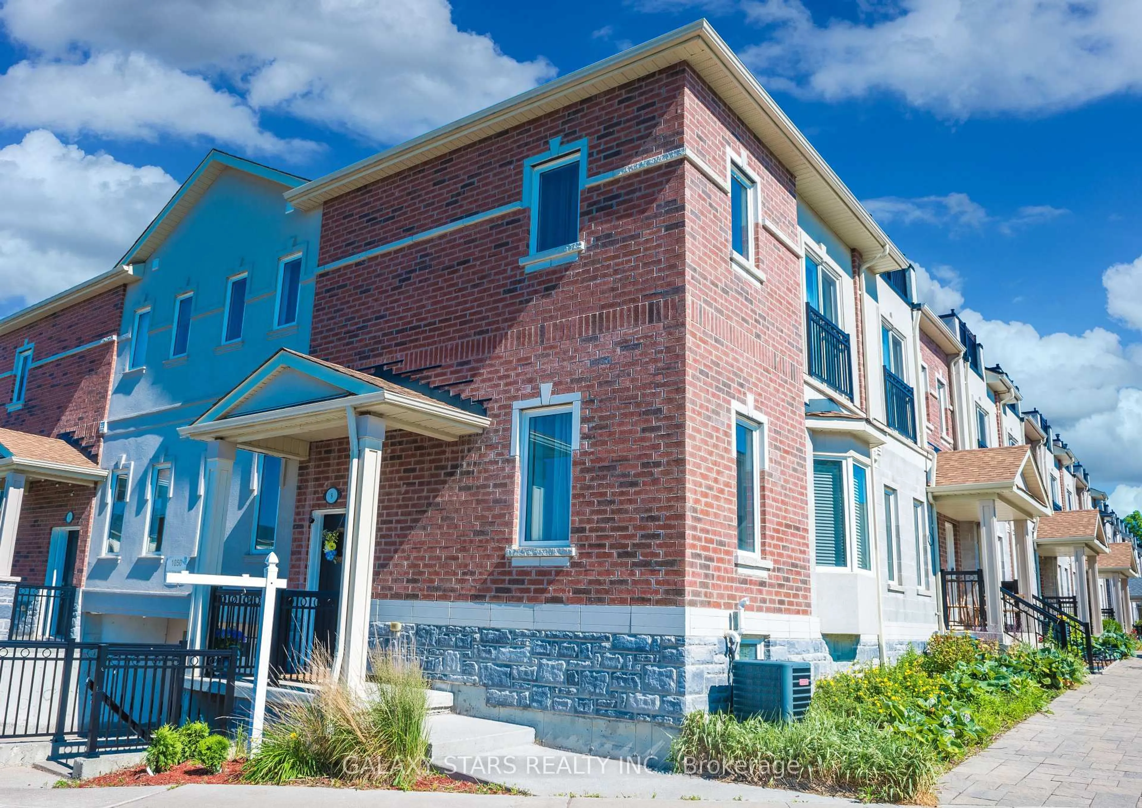 Home with brick exterior material, building for 1050 Elton Way #8, Whitby Ontario L1N 0L3