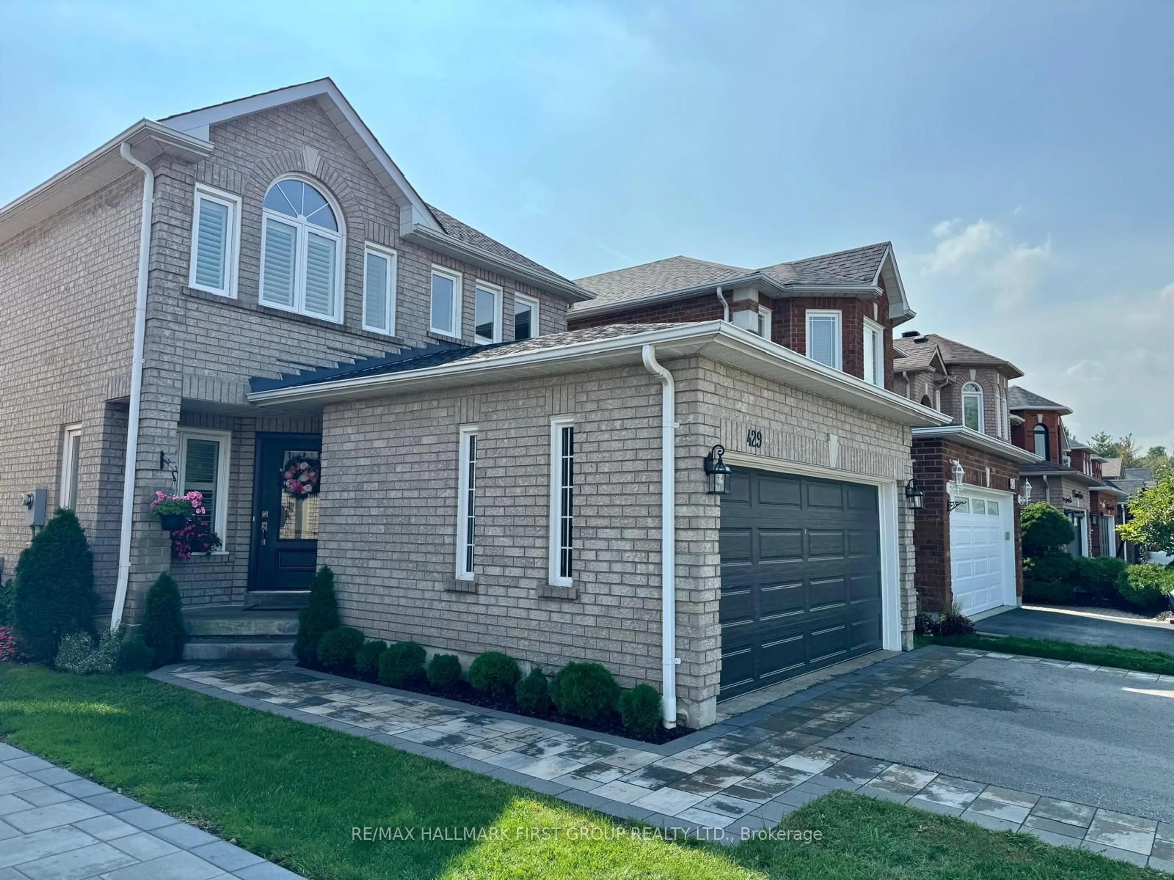 Home with brick exterior material, street for 429 Summerpark Cres, Pickering Ontario L1V 7B3
