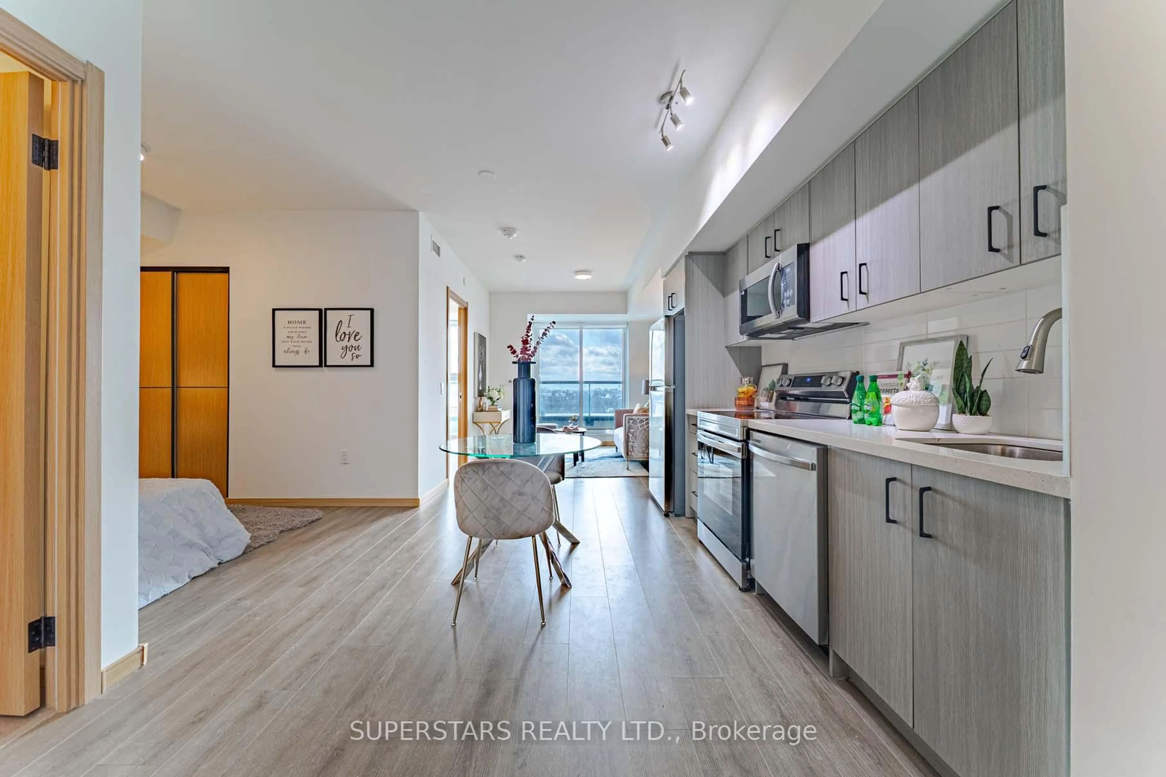 Open concept kitchen, unknown for 3429 Sheppard Ave #805, Toronto Ontario M1T 0C2