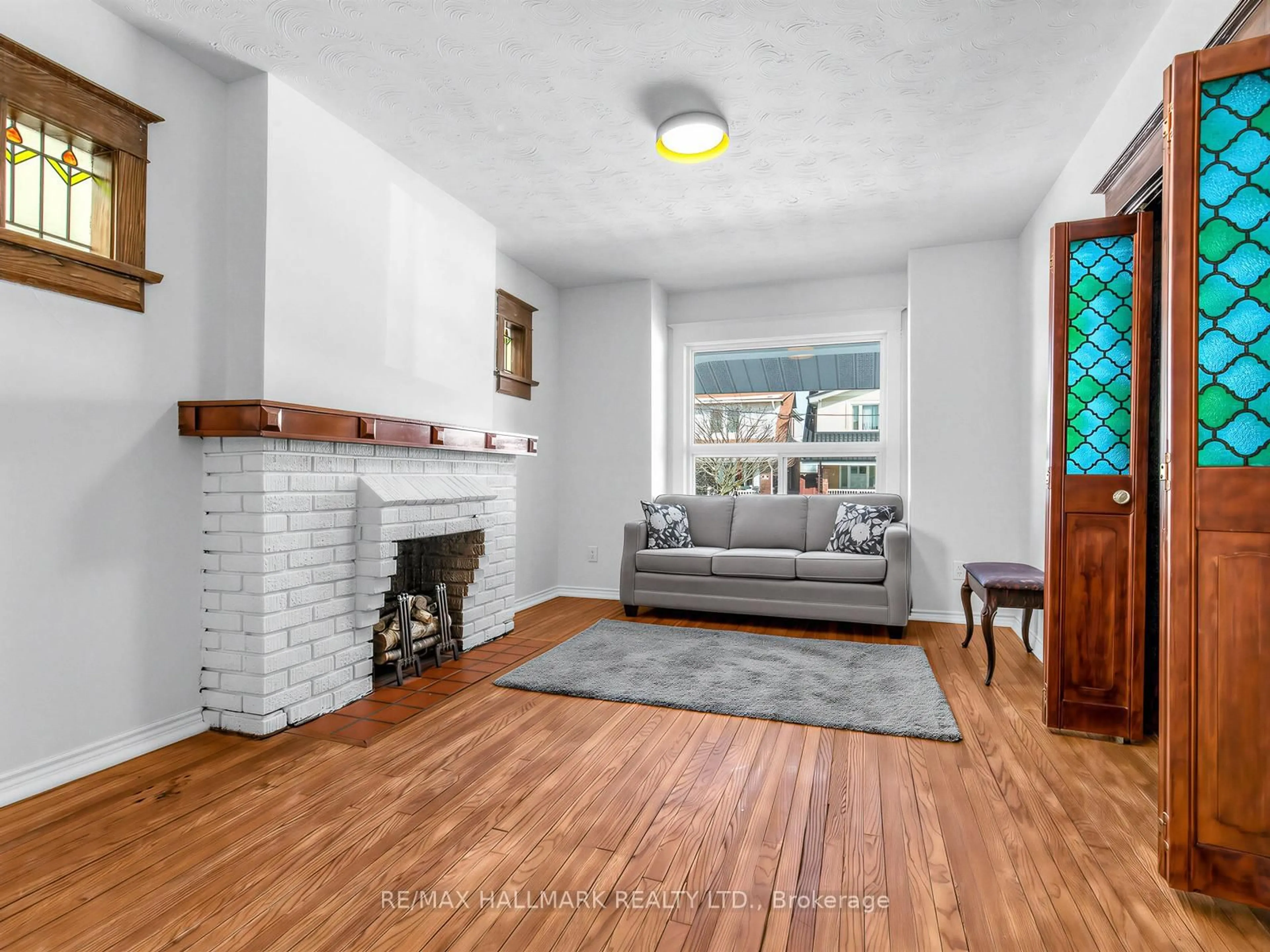 Living room with furniture, unknown for 102 Caithness Ave, Toronto Ontario M4J 3Y1