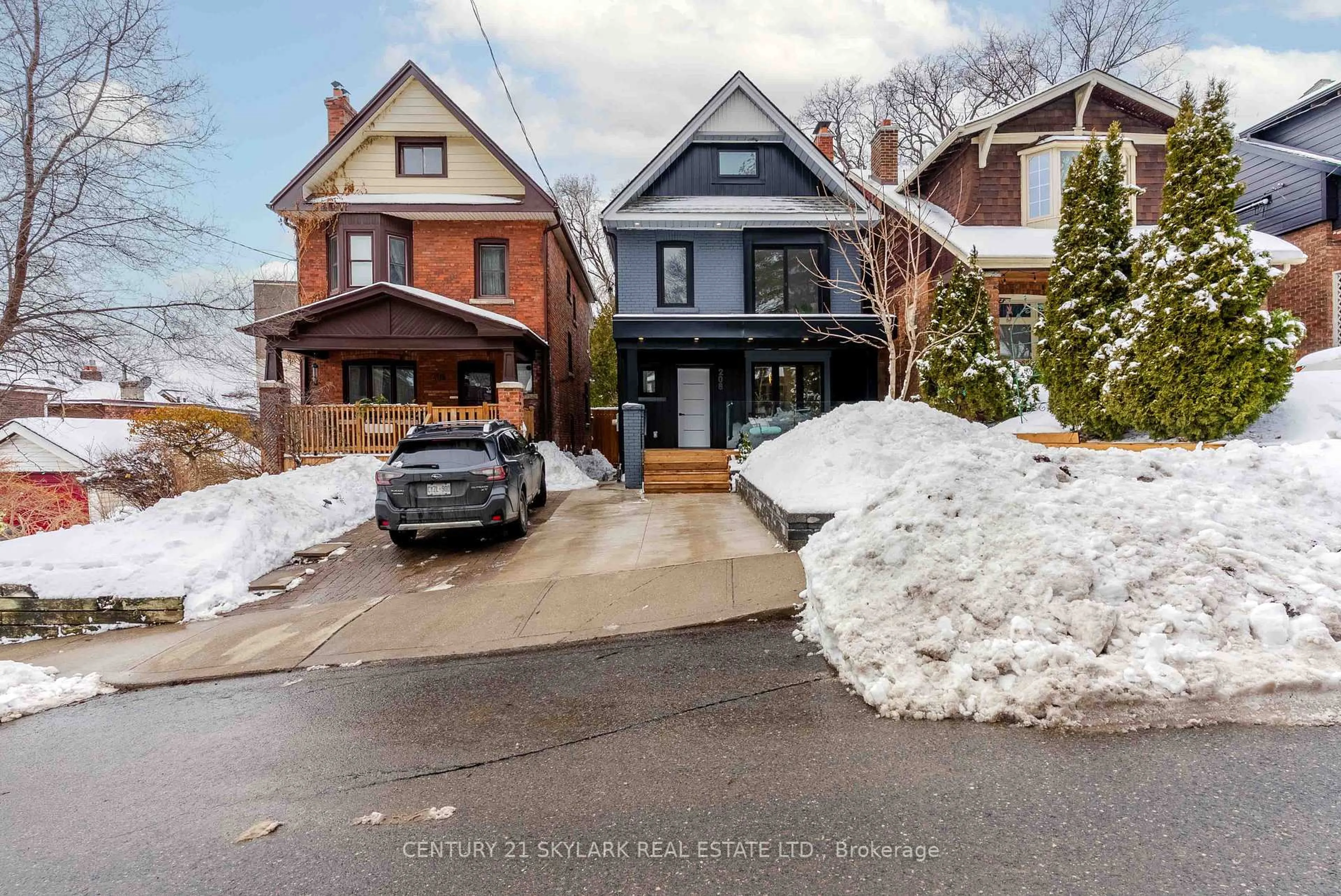 Home with brick exterior material, street for 208 Gainsborough Rd, Toronto Ontario M4L 3C6