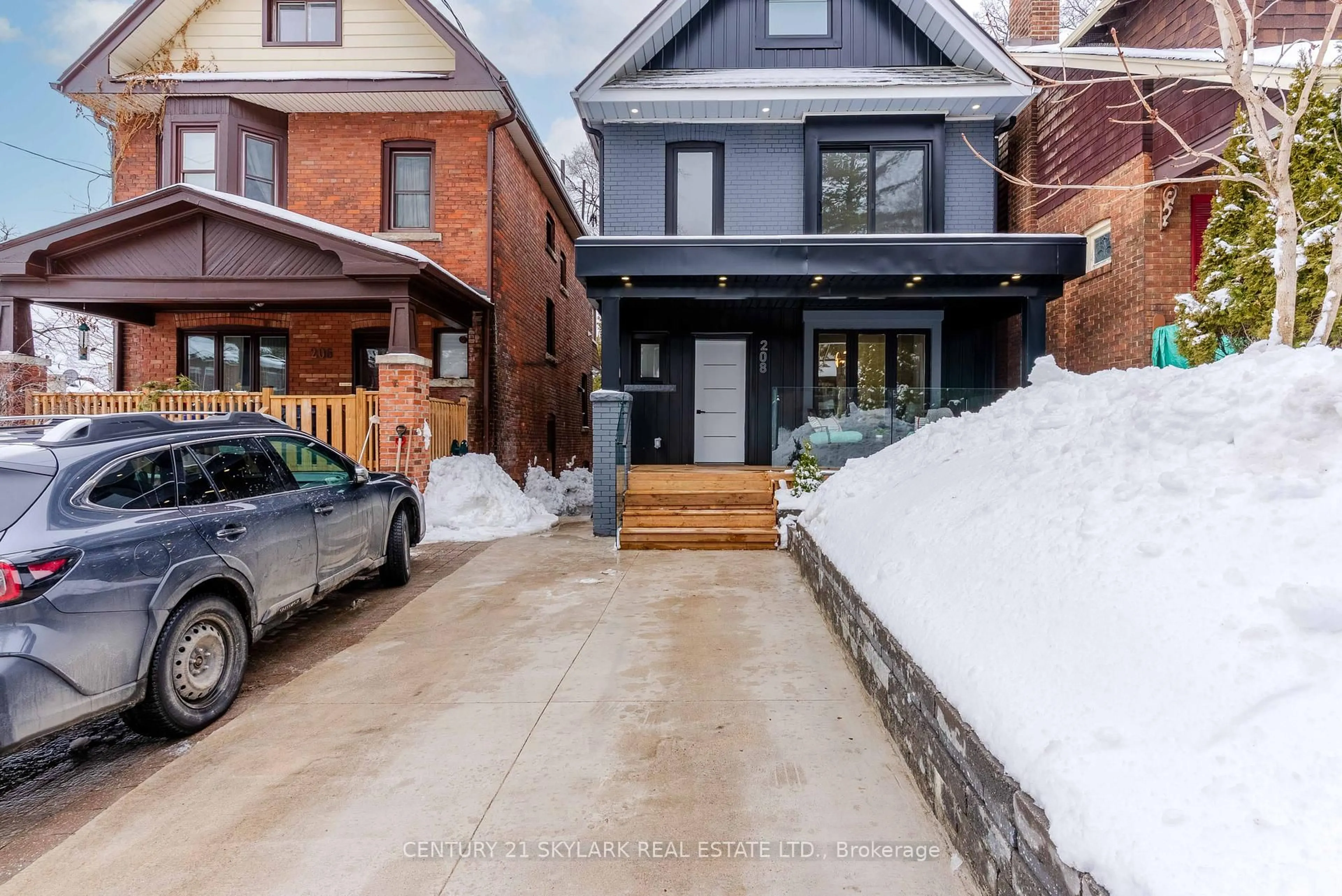 Home with brick exterior material, street for 208 Gainsborough Rd, Toronto Ontario M4L 3C6