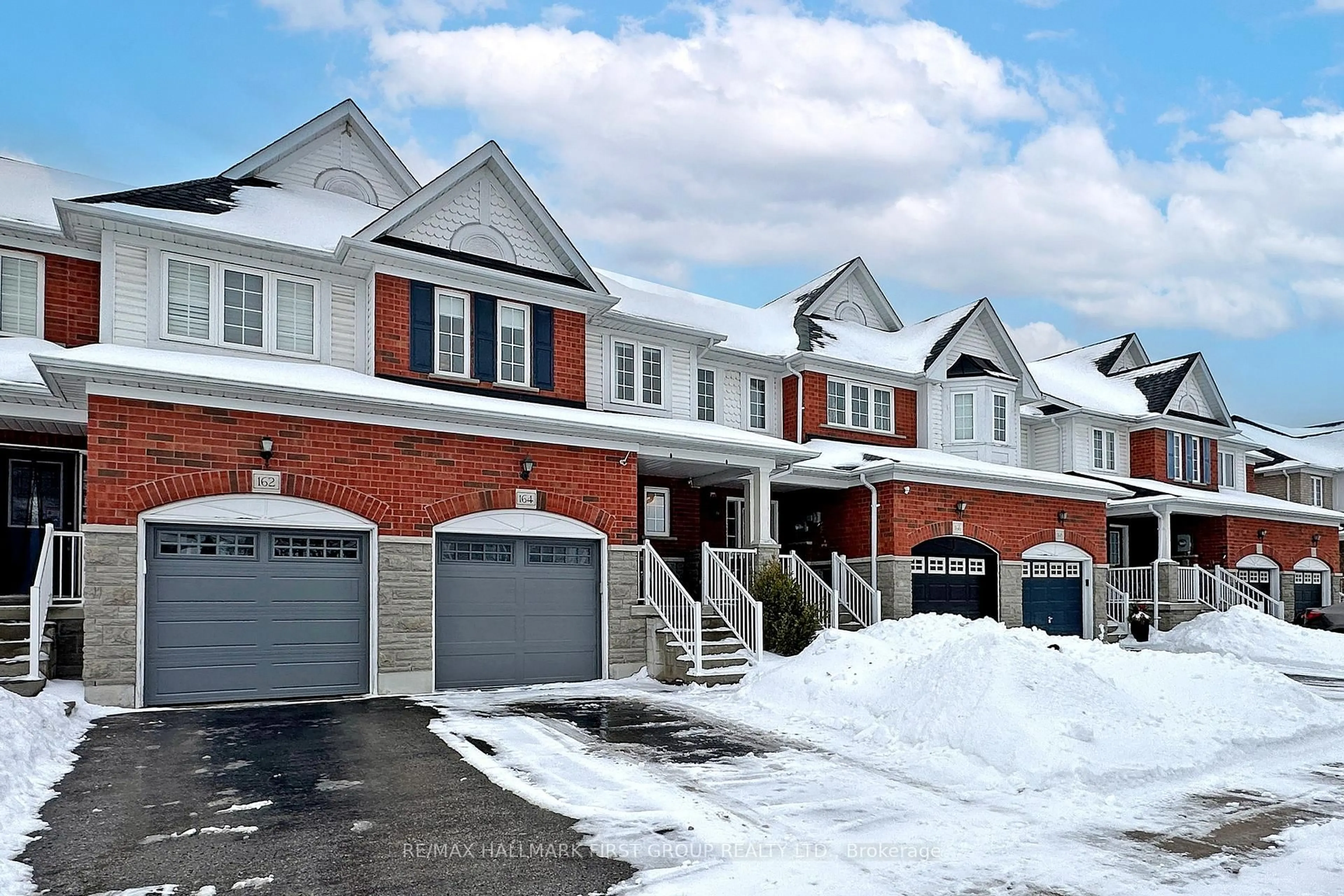 Home with brick exterior material, street for 164 Lady May Dr, Whitby Ontario L1R 3M4