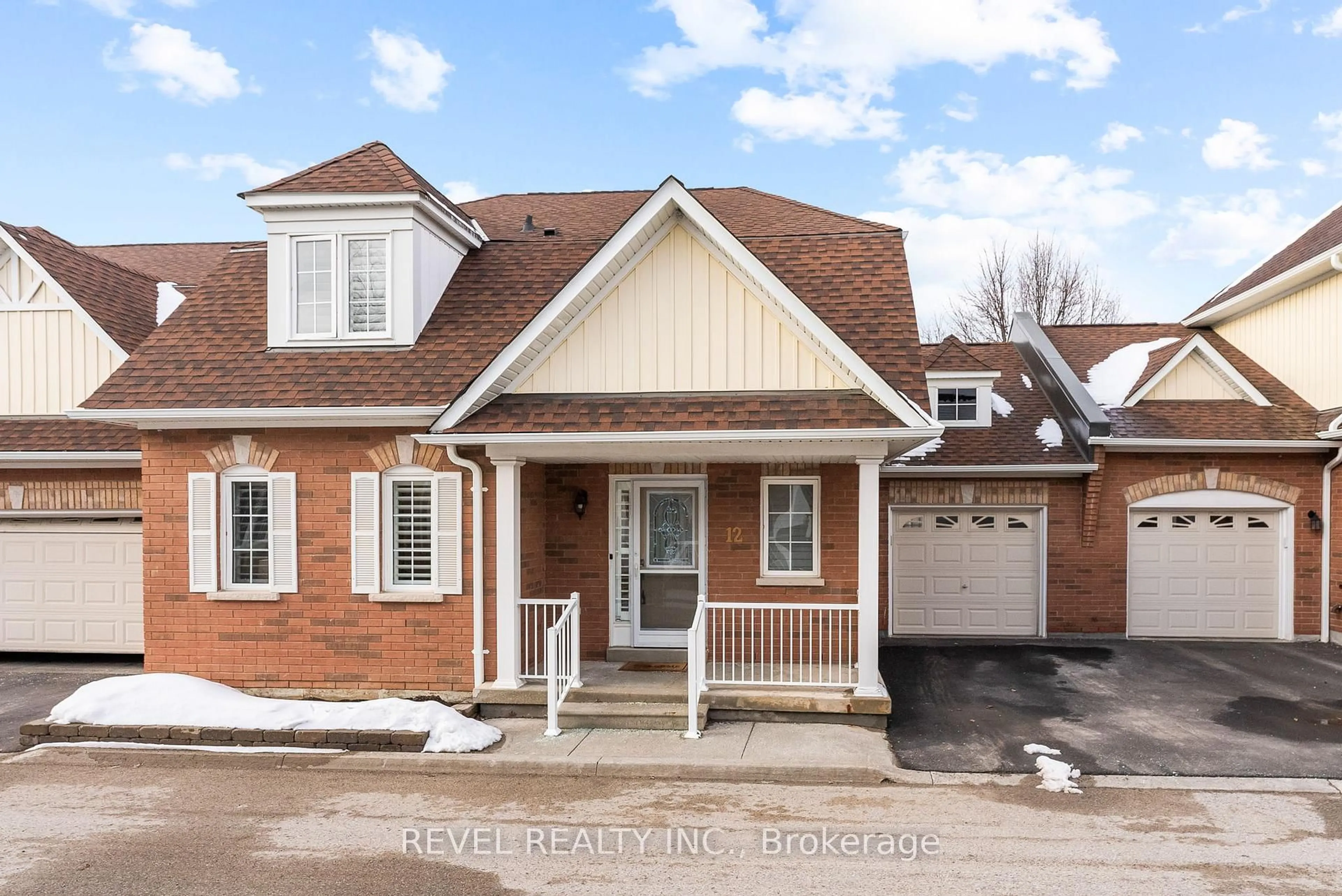 Home with brick exterior material, street for 12 Hirshfield Lane, Ajax Ontario L1T 4Z7