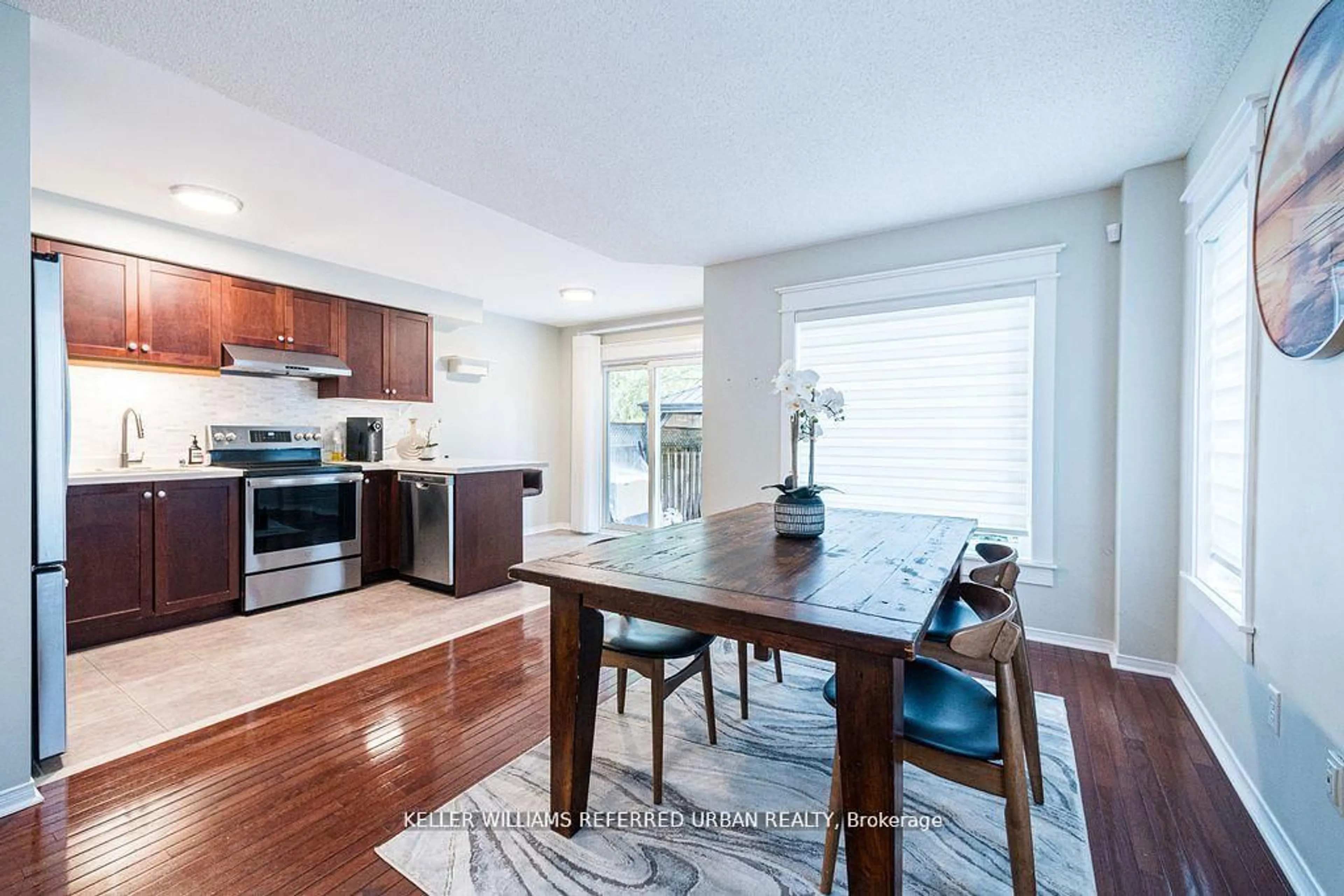 Open concept kitchen, wood/laminate floor for 16 Sprucedale Way #68, Whitby Ontario L1N 9T8