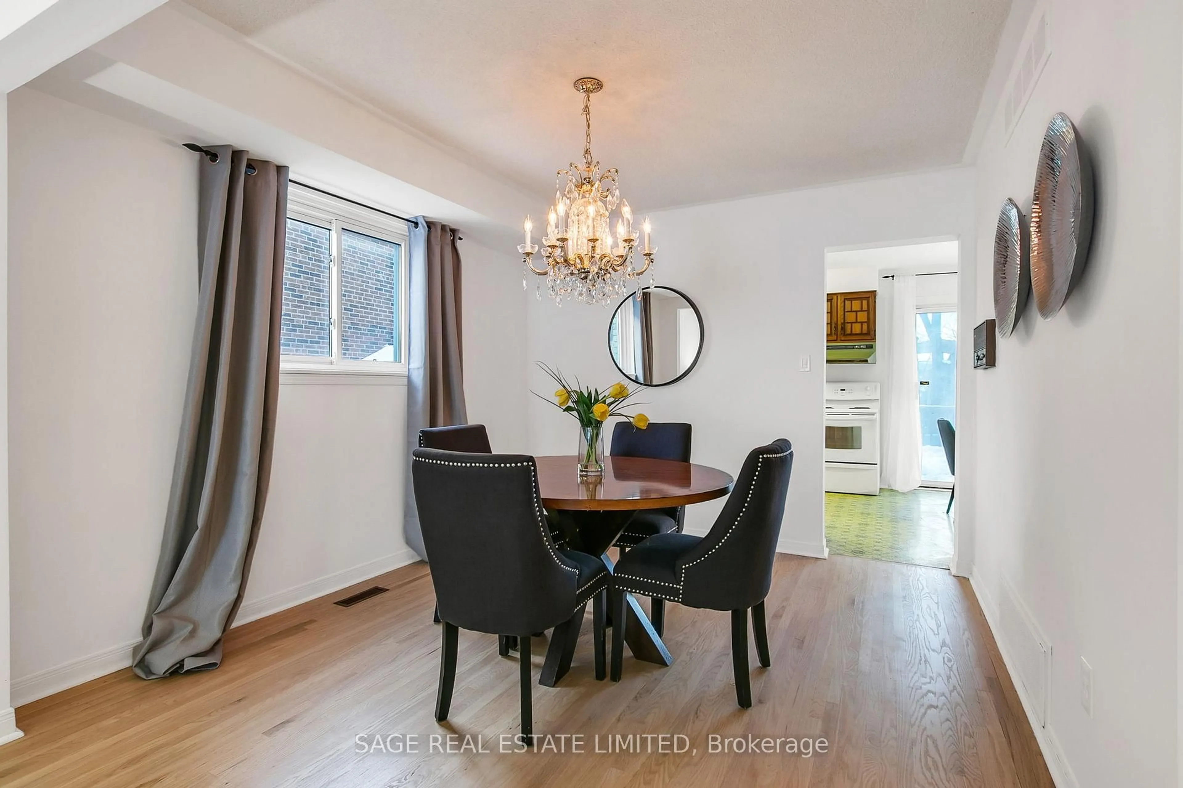 Dining room, wood/laminate floor for 22 Craketts Ave, Toronto Ontario M1S 3W6