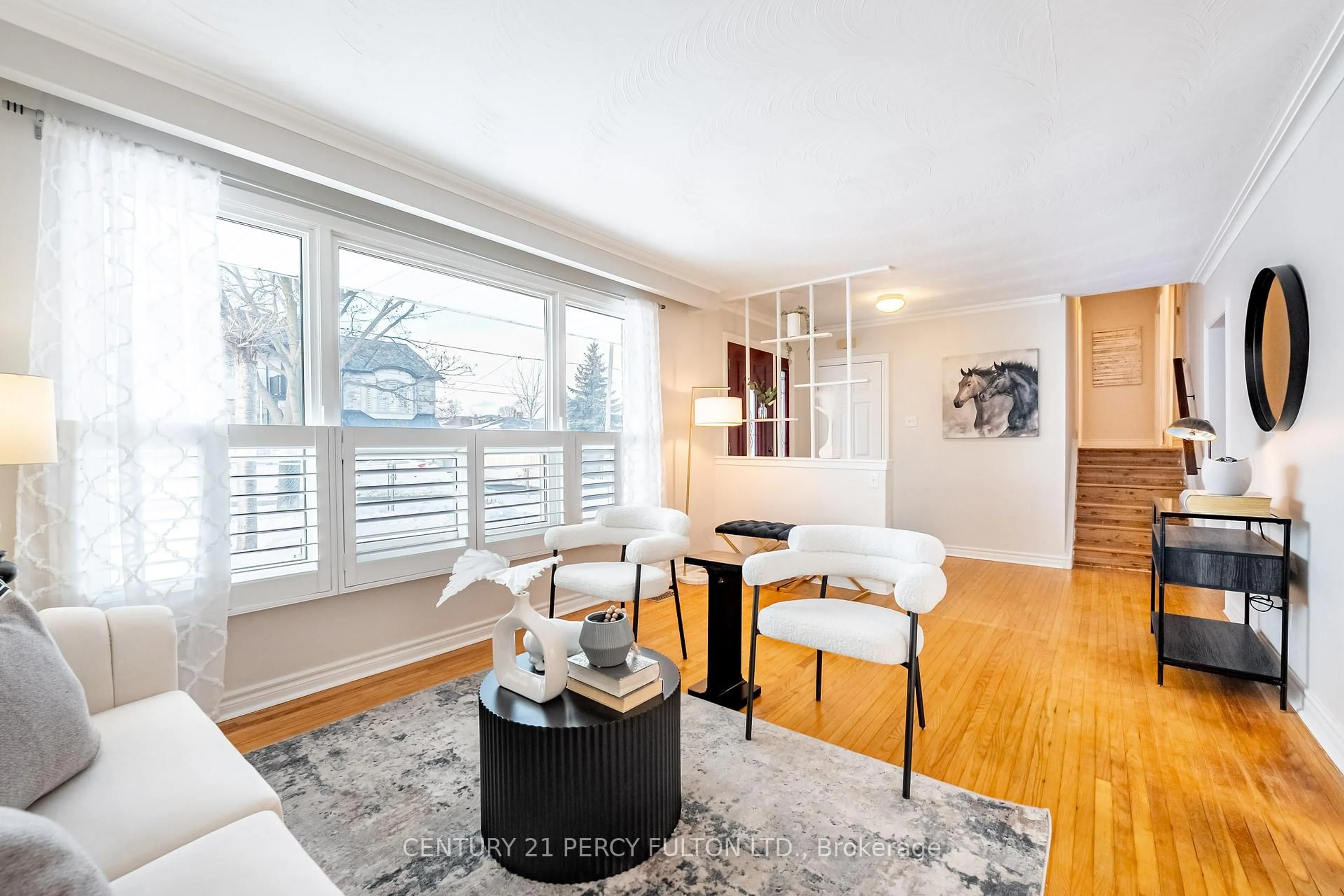 Living room with furniture, wood/laminate floor for 1 Marcella St, Toronto Ontario M1G 1K7
