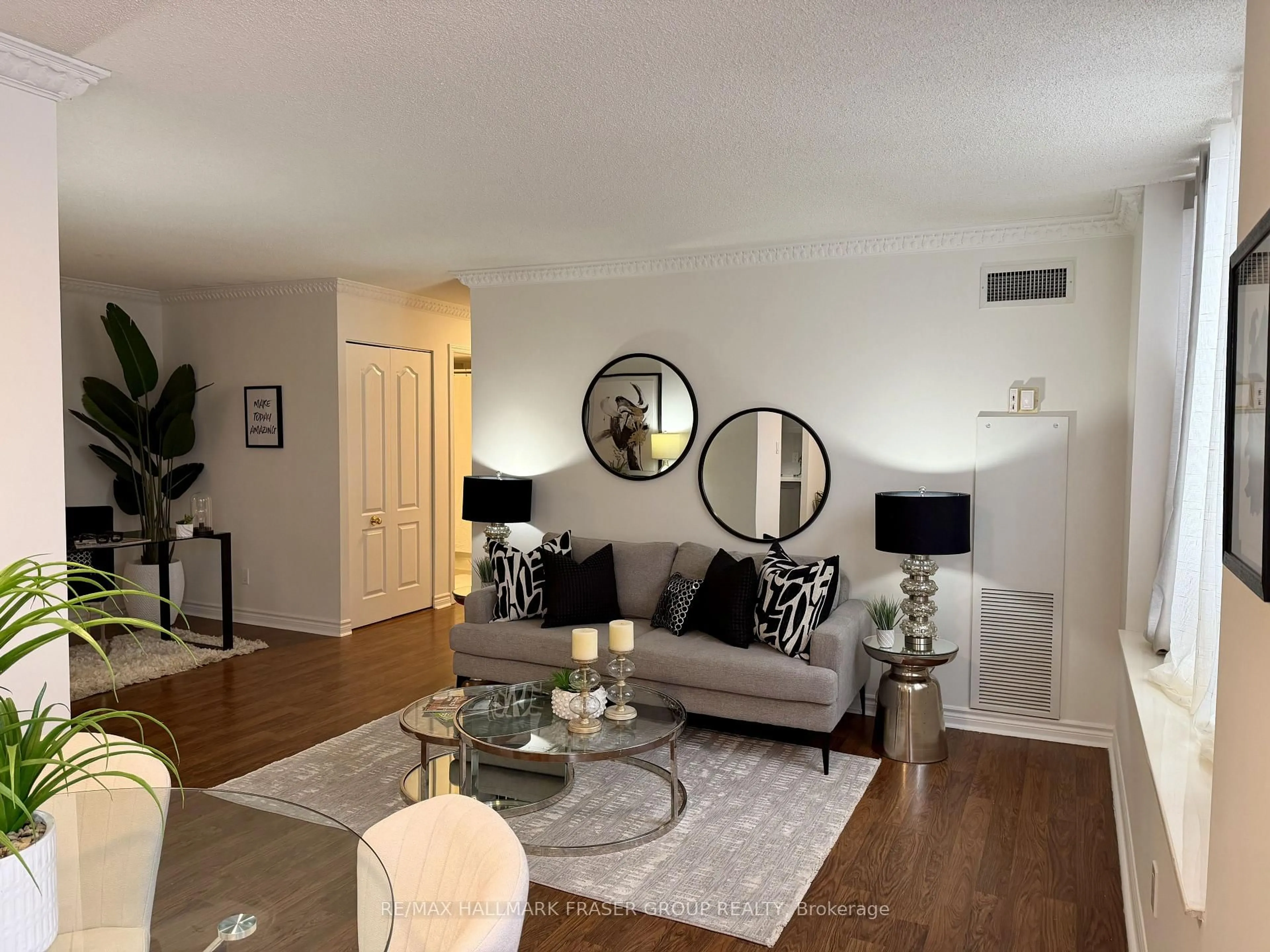 Living room with furniture, unknown for 1883 Mcnicoll Ave #222, Toronto Ontario M1V 5M3