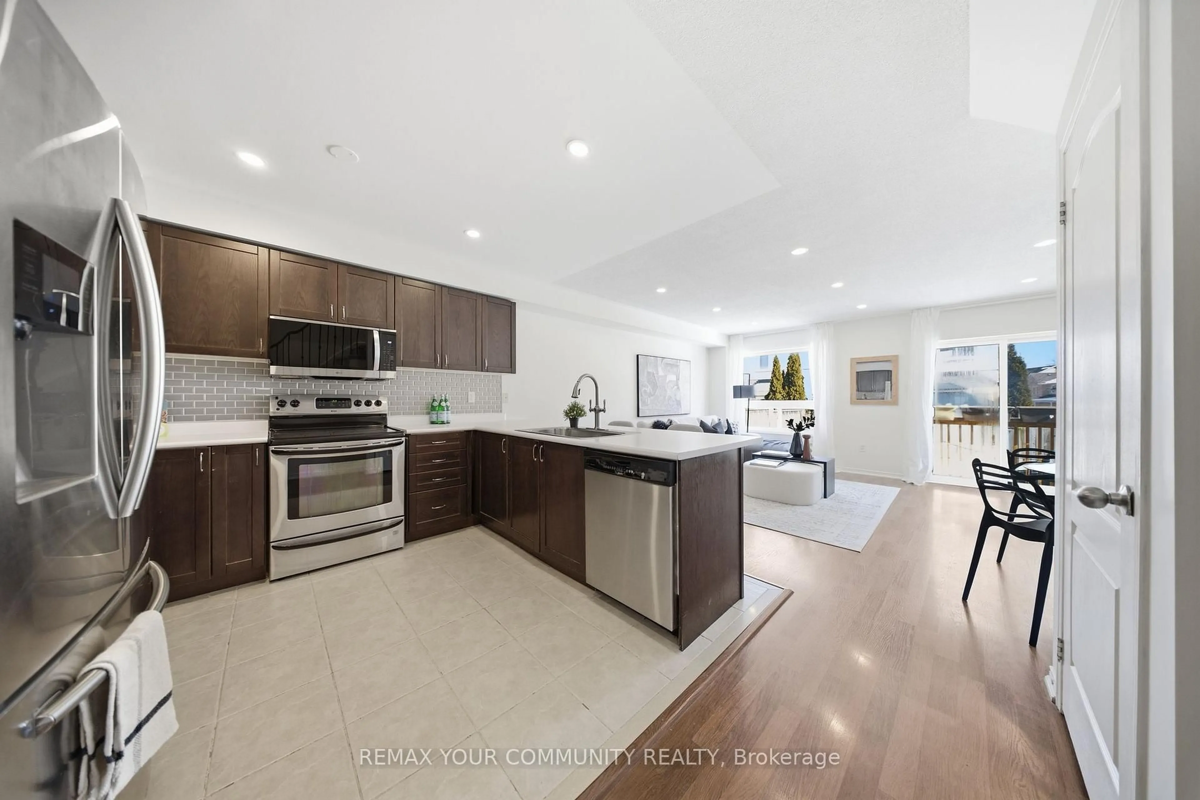 Open concept kitchen, ceramic/tile floor for 71 Aldonschool Crt, Ajax Ontario L1S 0C5