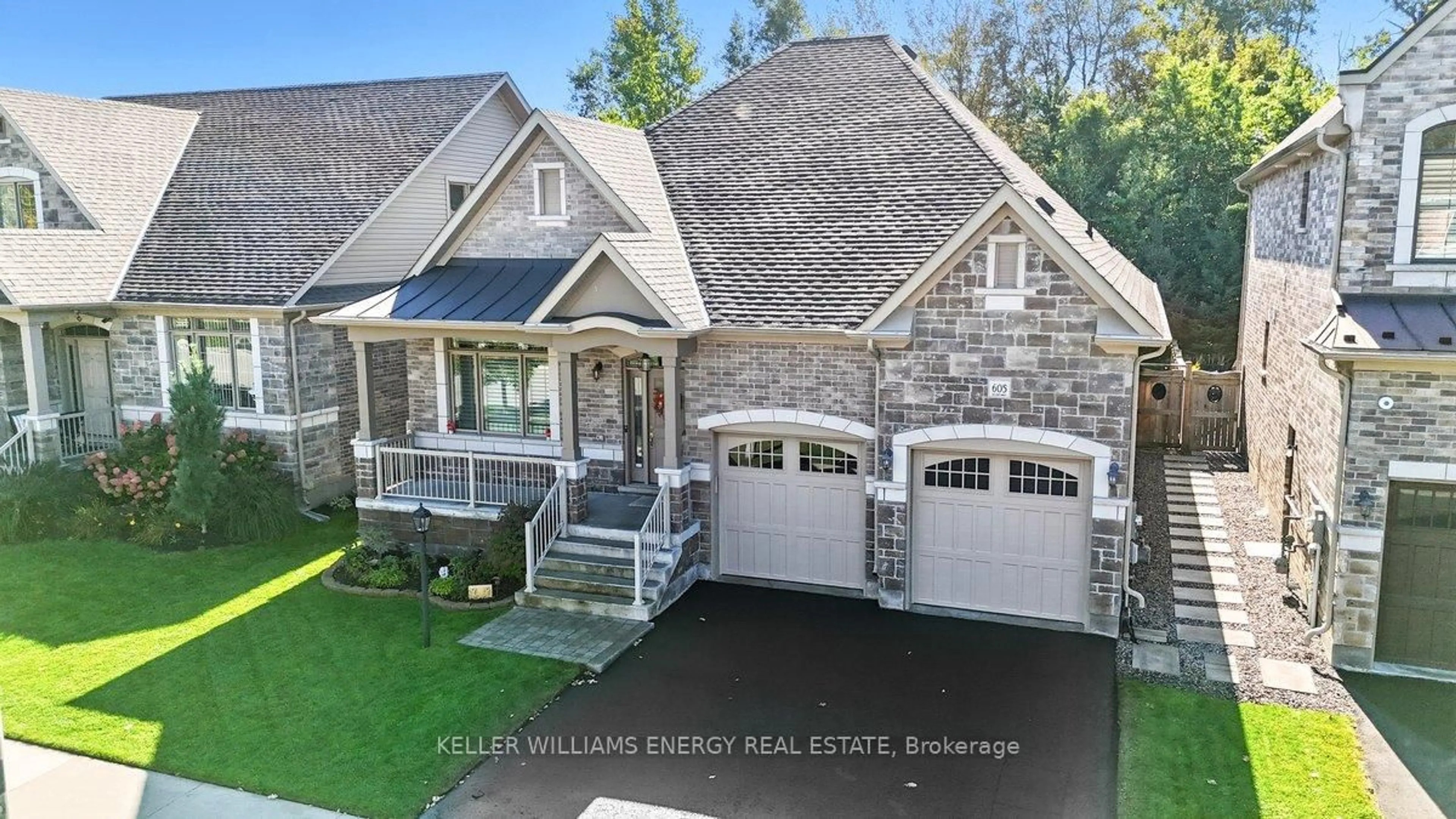 Home with brick exterior material, street for 605 George Reynolds Dr, Clarington Ontario L1E 0A8