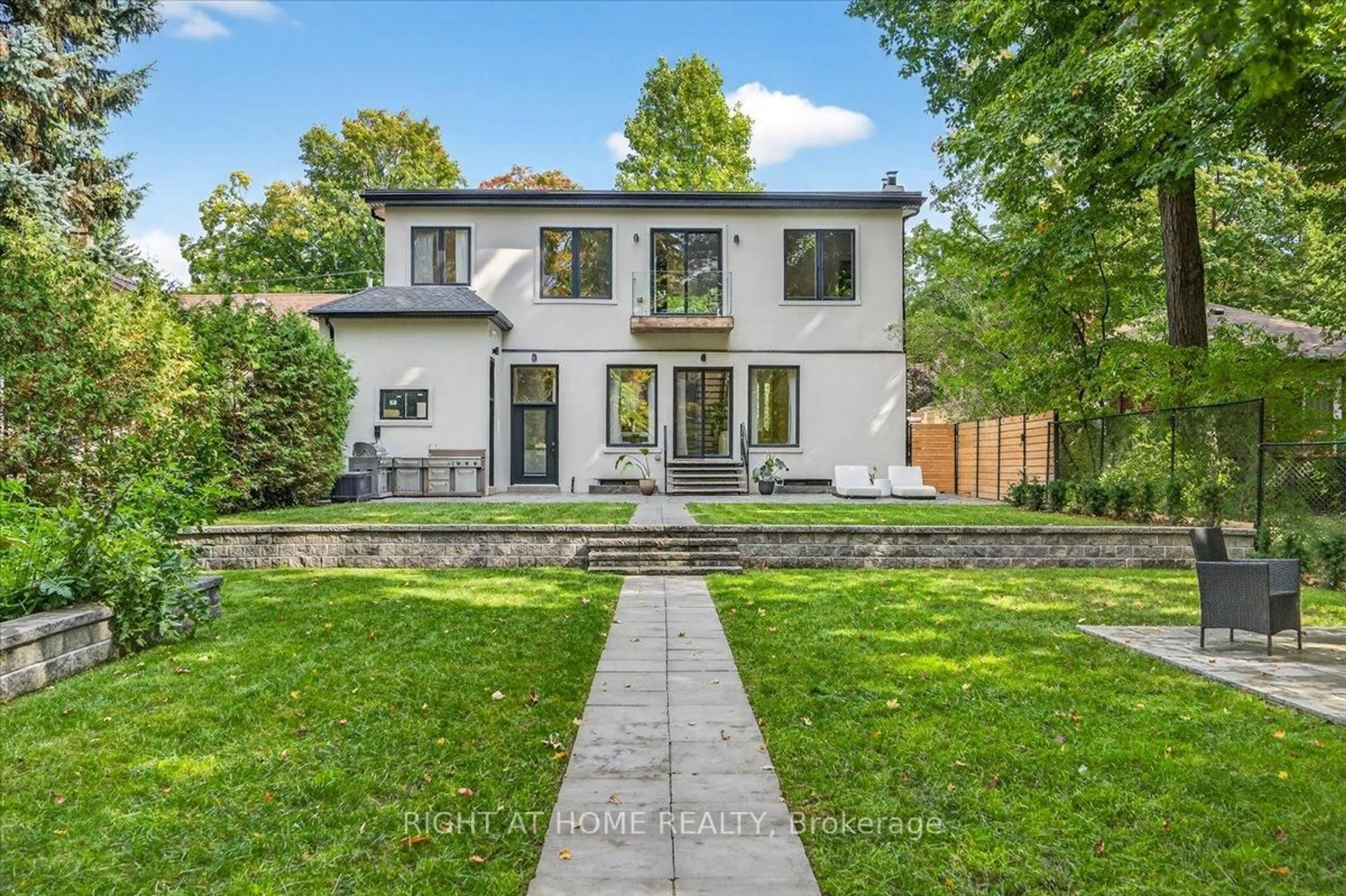 Home with brick exterior material, street for 64 Larwood Blvd, Toronto Ontario M1M 2M5