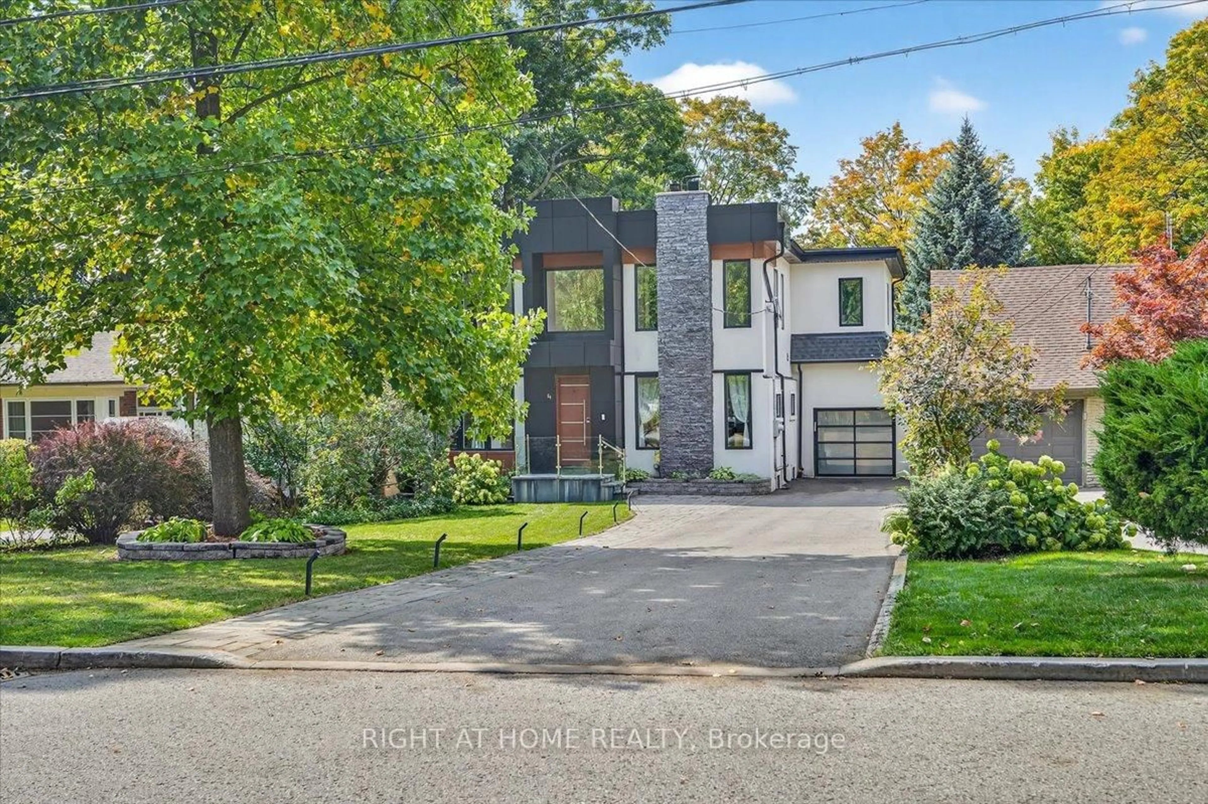 Home with brick exterior material, street for 64 Larwood Blvd, Toronto Ontario M1M 2M5