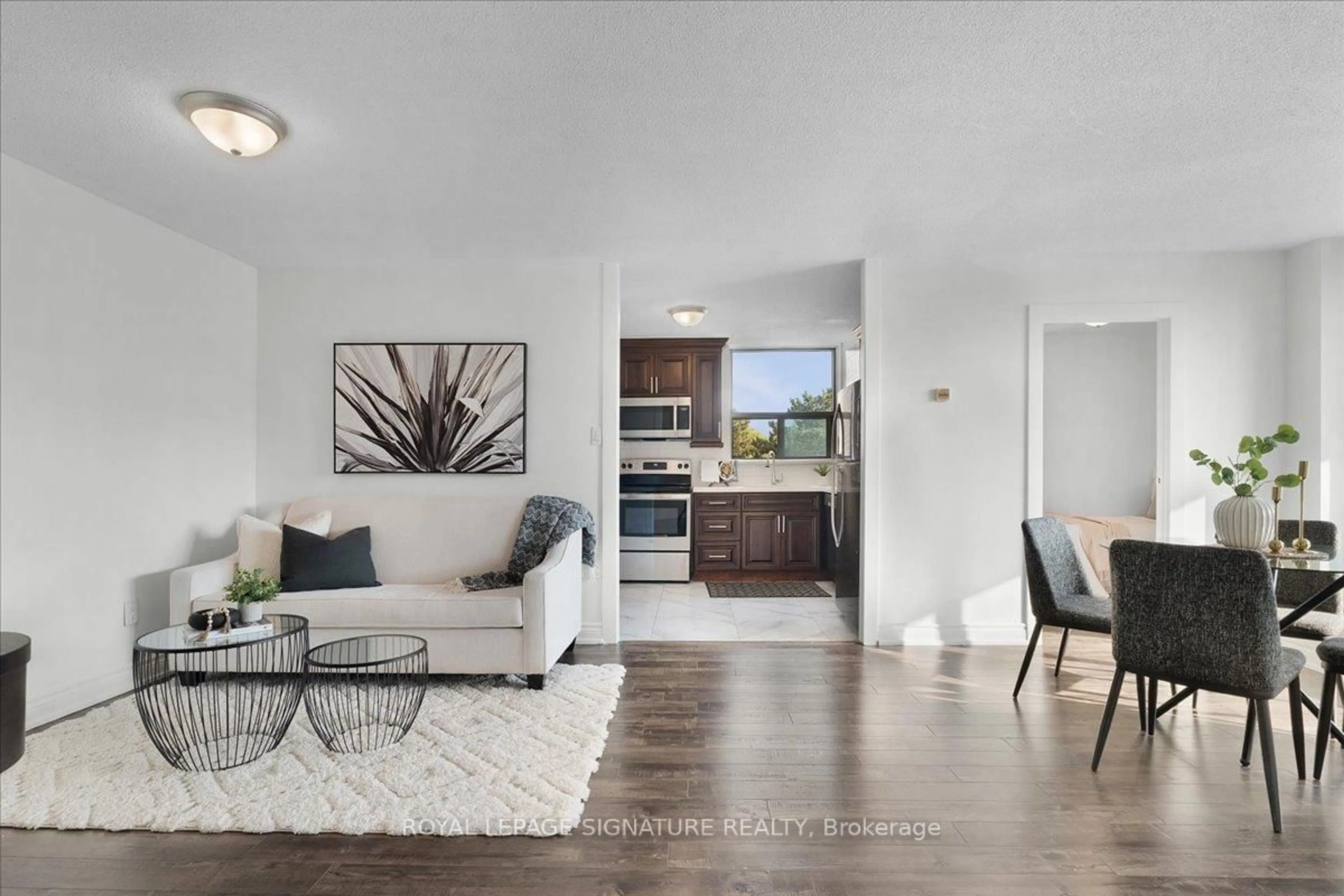 Living room with furniture, unknown for 100 Wingarden Crt #315, Toronto Ontario M1B 2P4