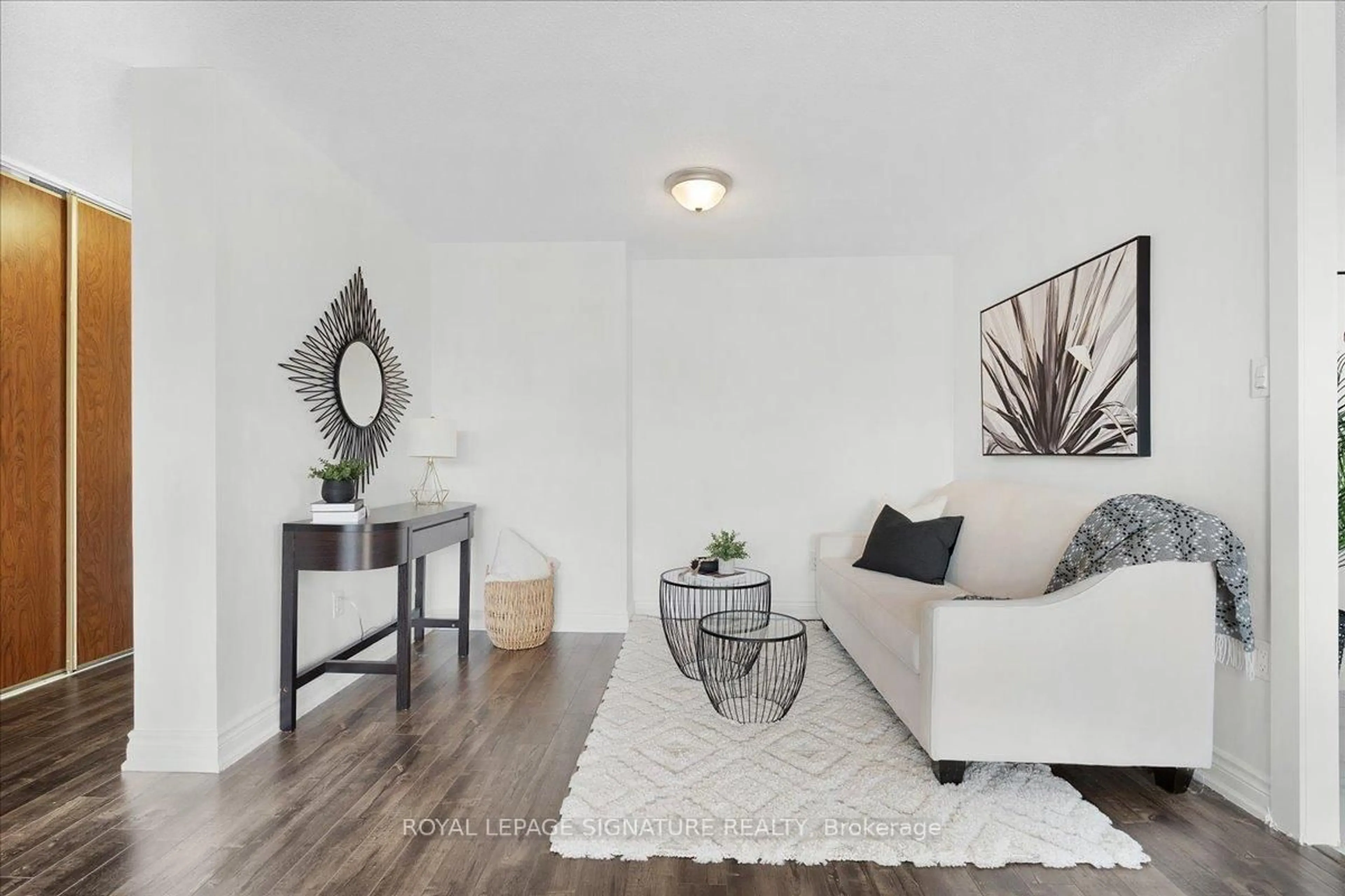 Living room with furniture, wood/laminate floor for 100 Wingarden Crt #315, Toronto Ontario M1B 2P4