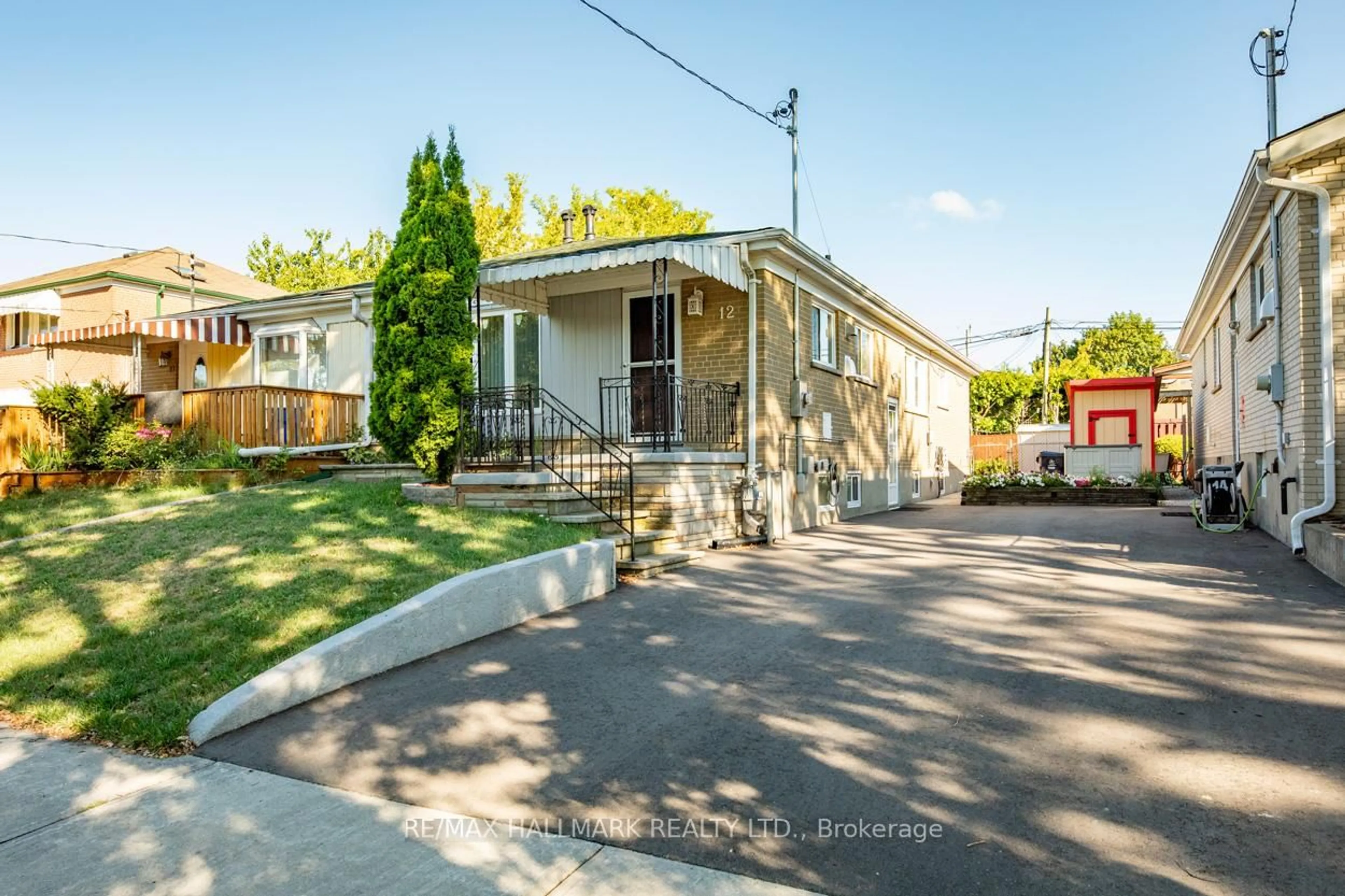 A pic from outside/outdoor area/front of a property/back of a property/a pic from drone, street for 12 Trinnell Blvd, Toronto Ontario M1L 1S7