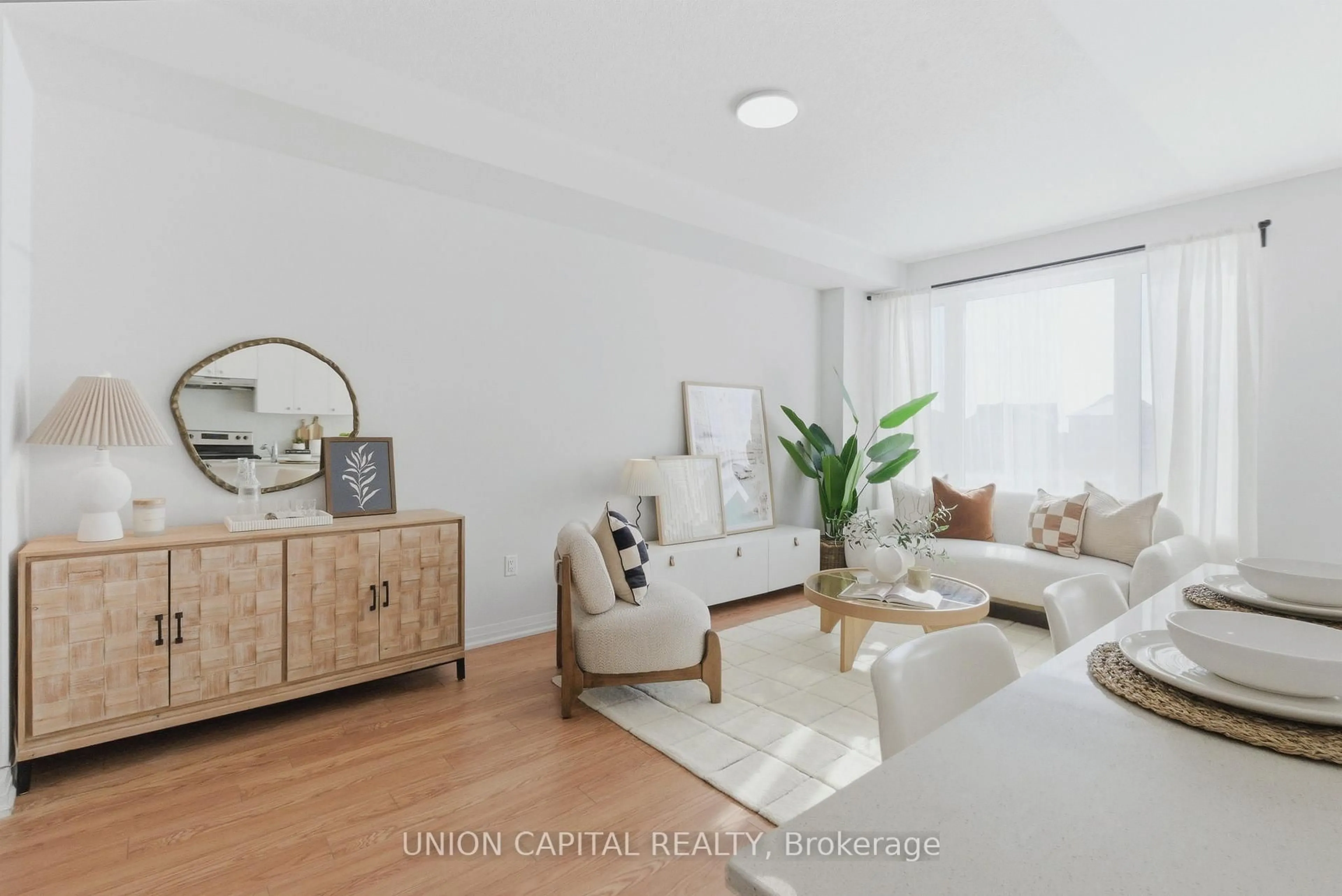 Living room with furniture, wood/laminate floor for 1177 Marathon Ave, Pickering Ontario L1X 0L8