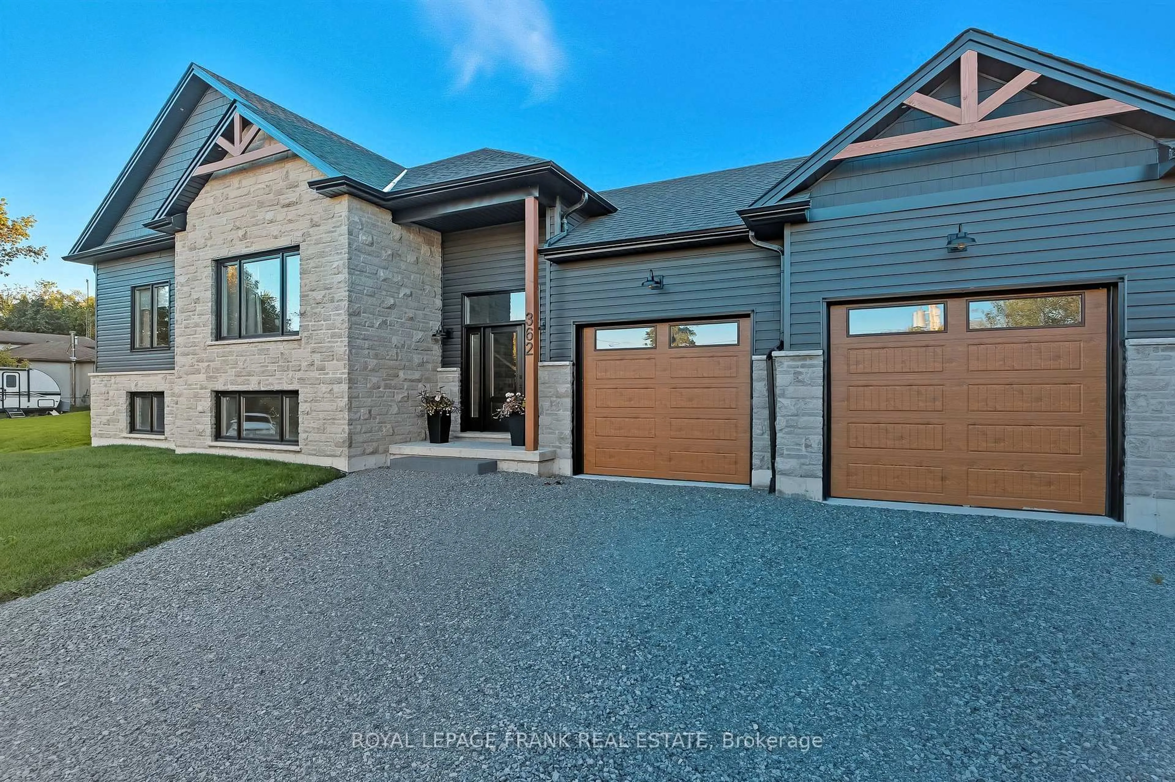 Home with brick exterior material, street for 362 Carnegie Beach Rd, Scugog Ontario L9L 1B6