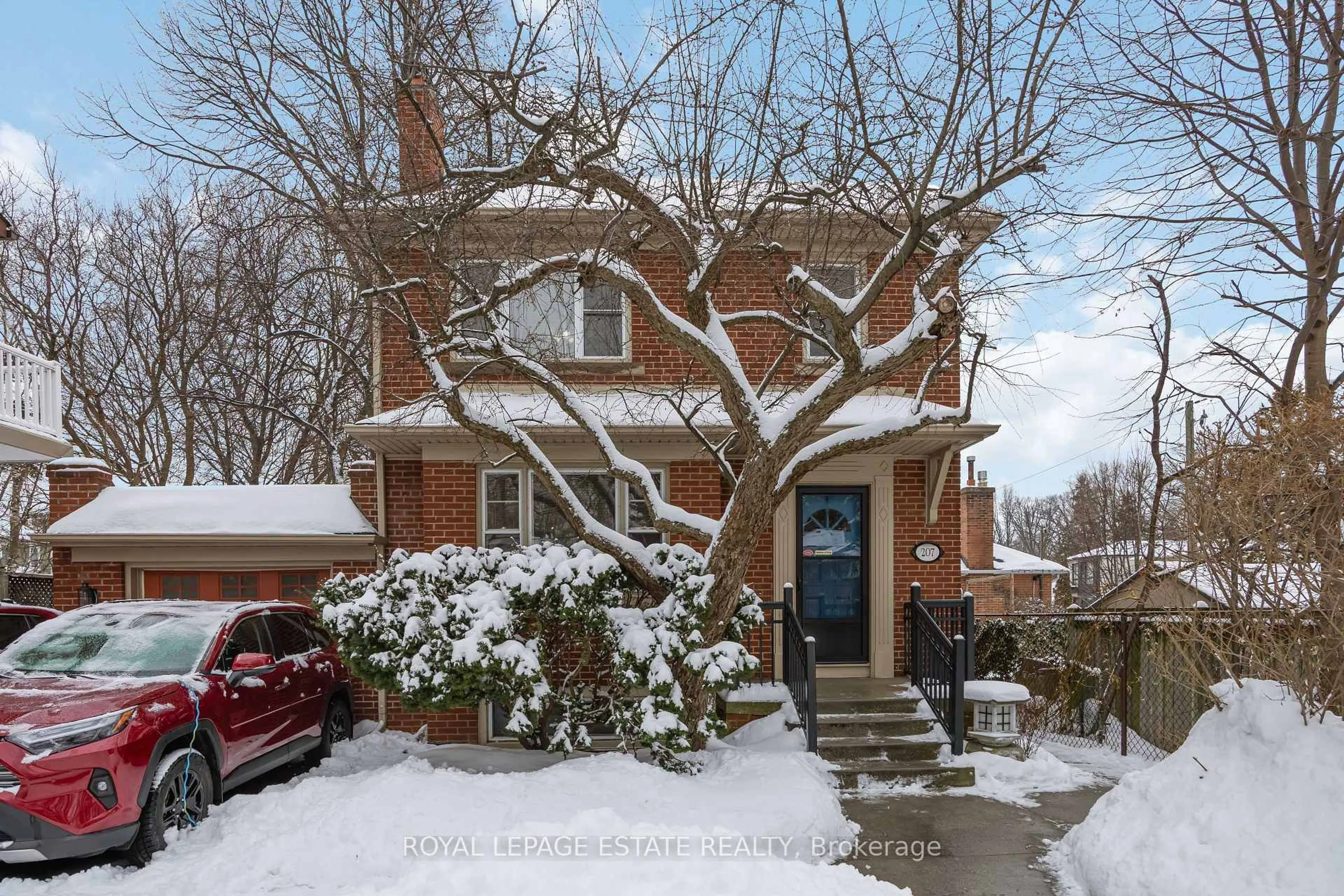 Home with brick exterior material, street for 207 Clonmore Dr, Toronto Ontario M1N 1Y3