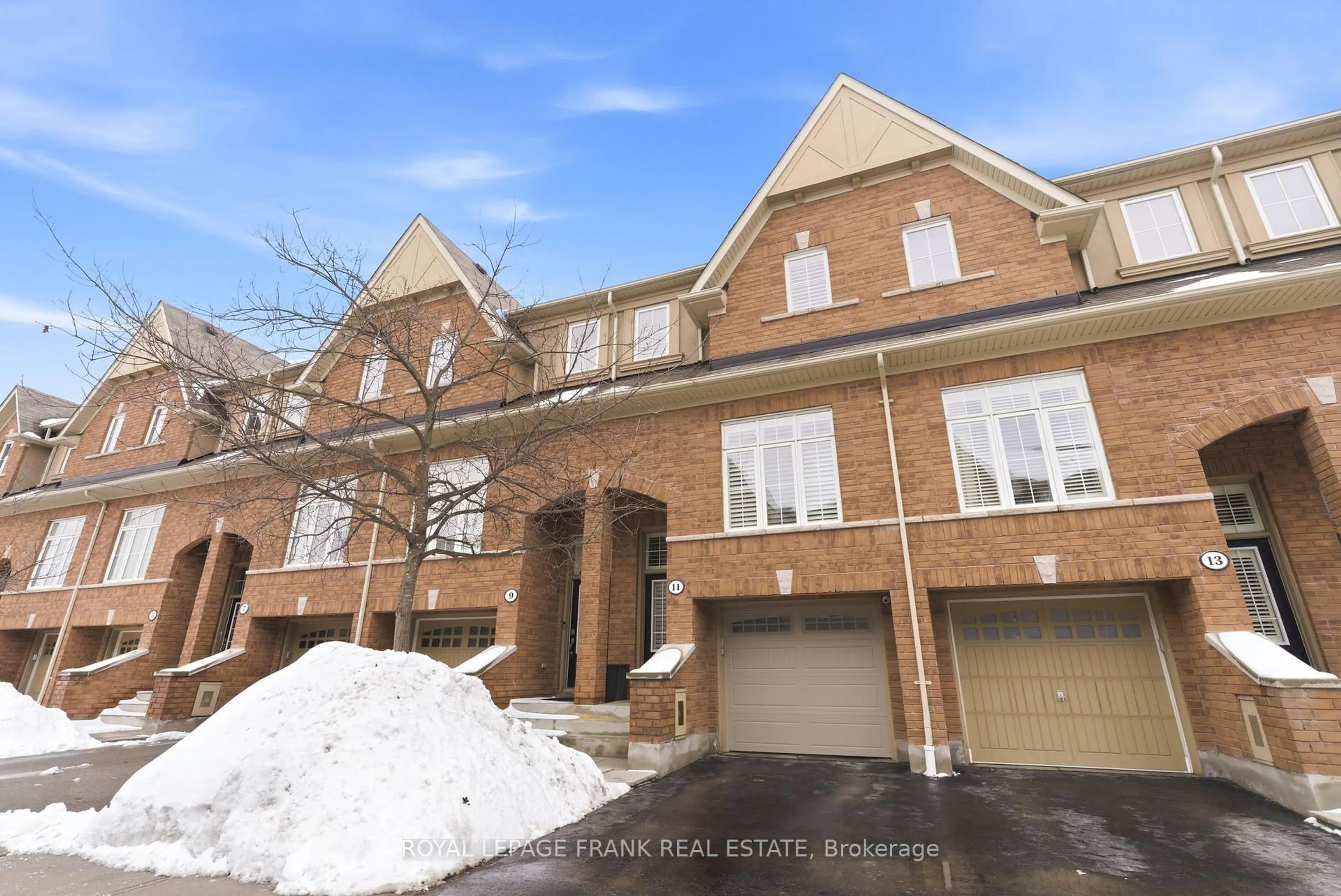Home with brick exterior material, street for 11 Burtonbury Lane #56, Ajax Ontario L1Z 0L3