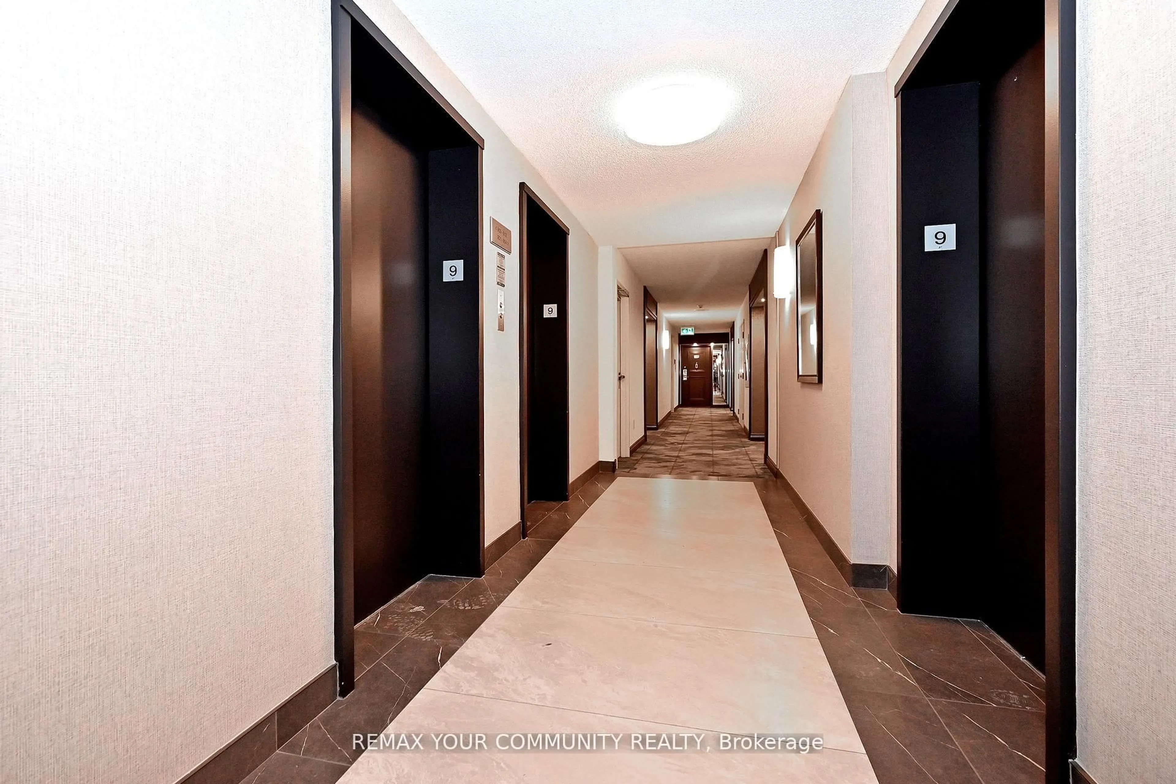 Indoor foyer for 275 Bamburgh Circ #910, Toronto Ontario M1W 3X4