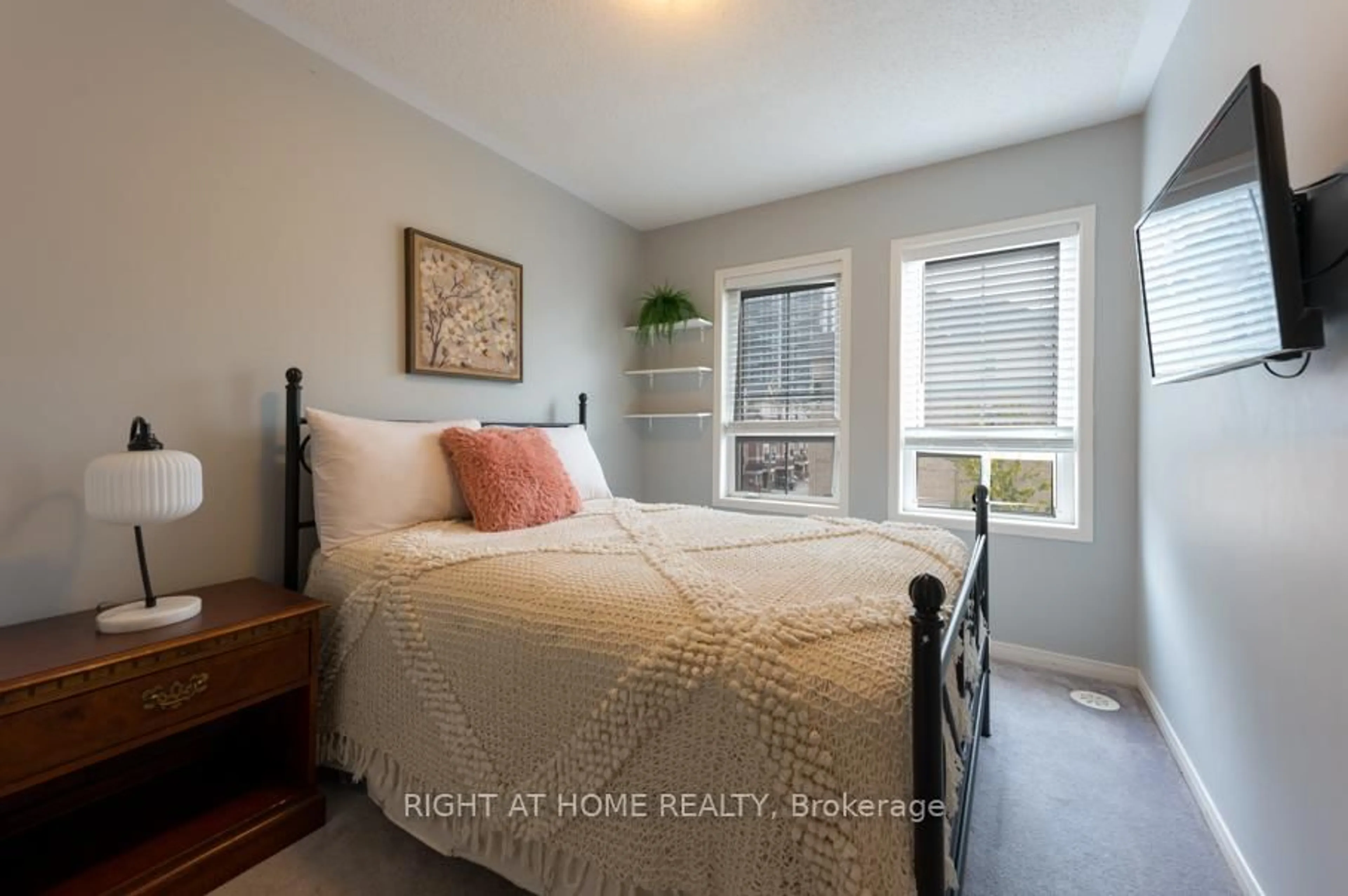 Bedroom with bed, wood/laminate floor for 2506 Bromus Path, Oshawa Ontario L1L 0K7