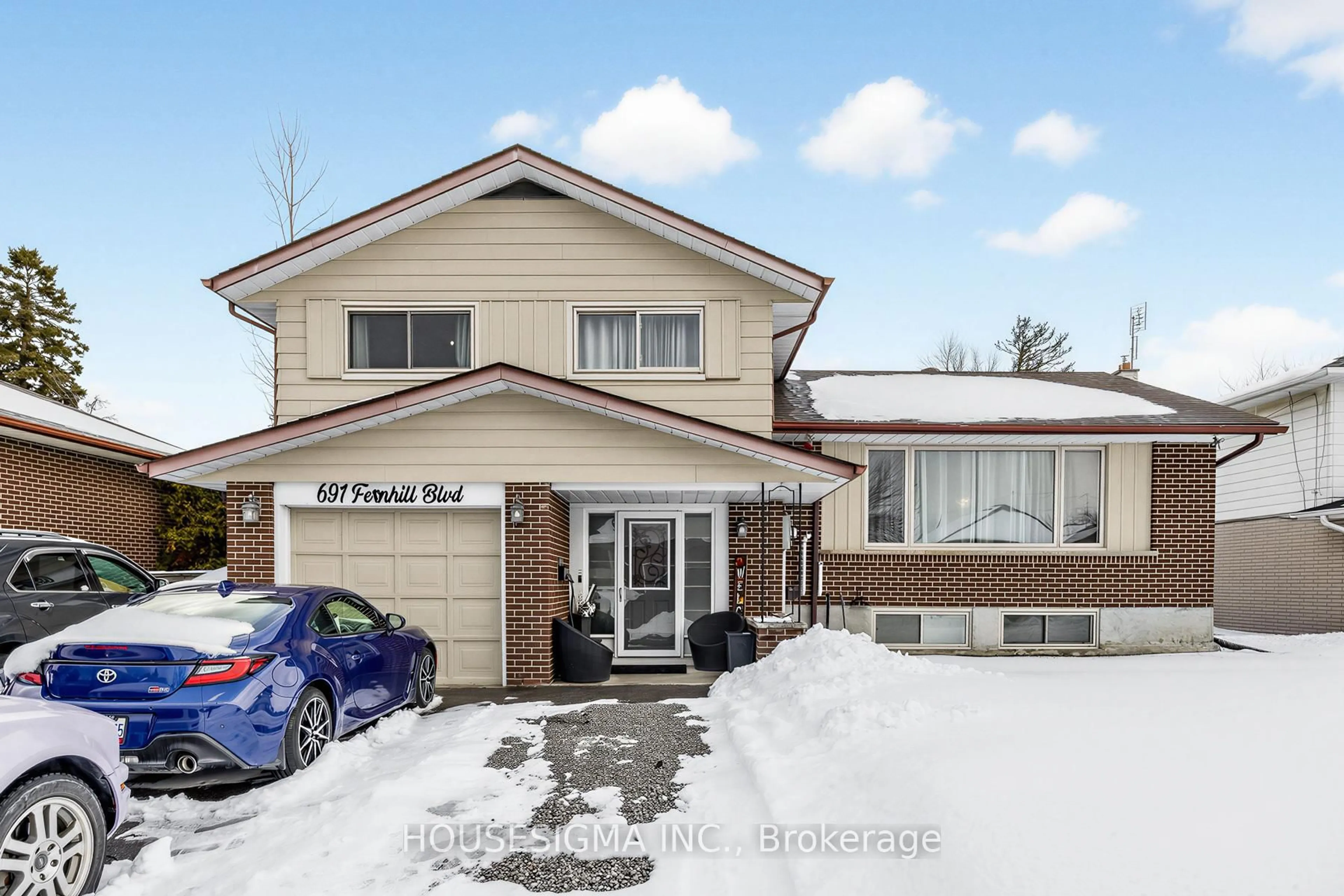 Home with brick exterior material, street for 691 Fernhill Blvd, Oshawa Ontario L1J 5K2