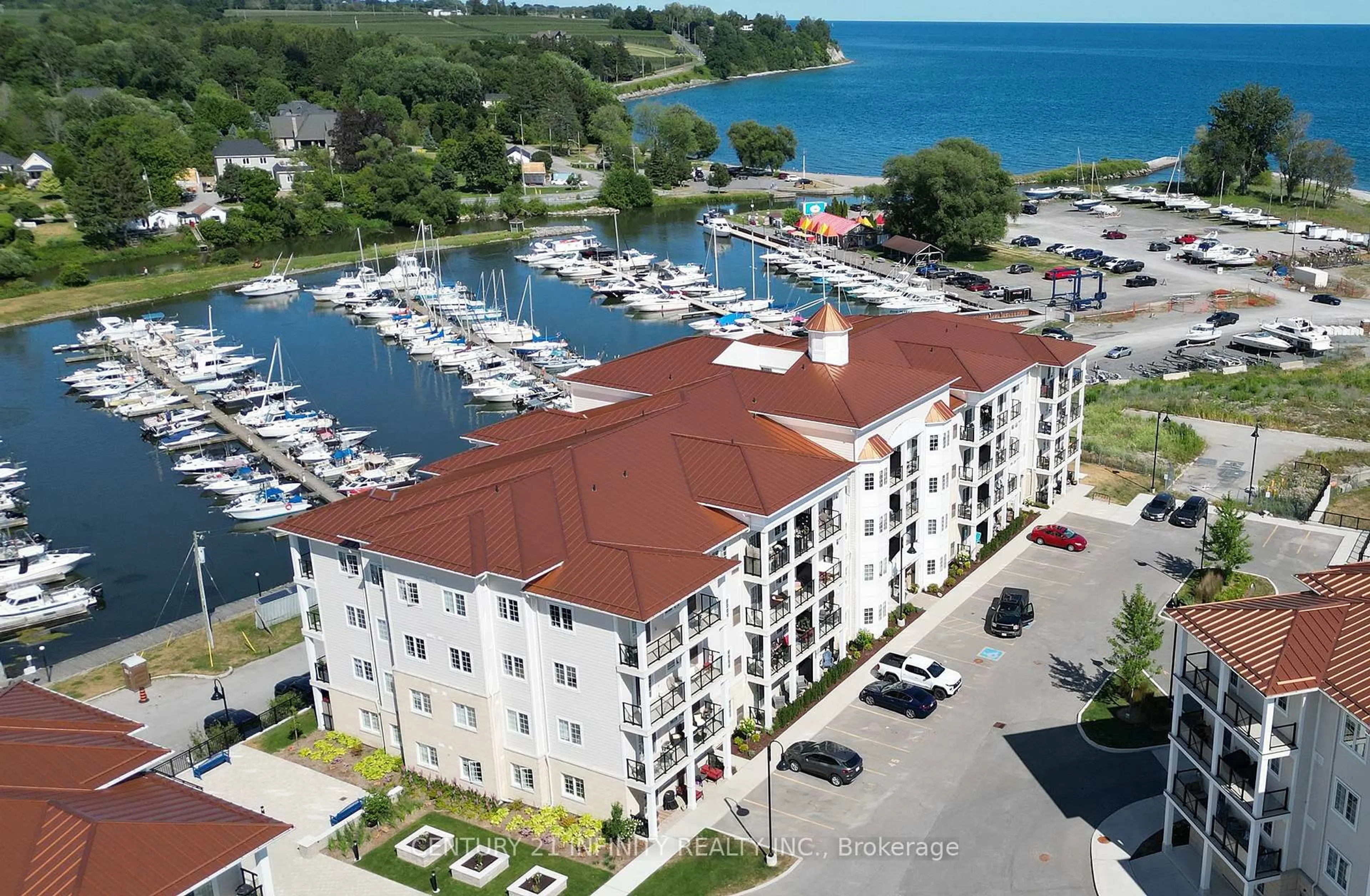 A pic from outside/outdoor area/front of a property/back of a property/a pic from drone, water/lake/river/ocean view for 70 Shipway Ave #204, Clarington Ontario L1B 0V7