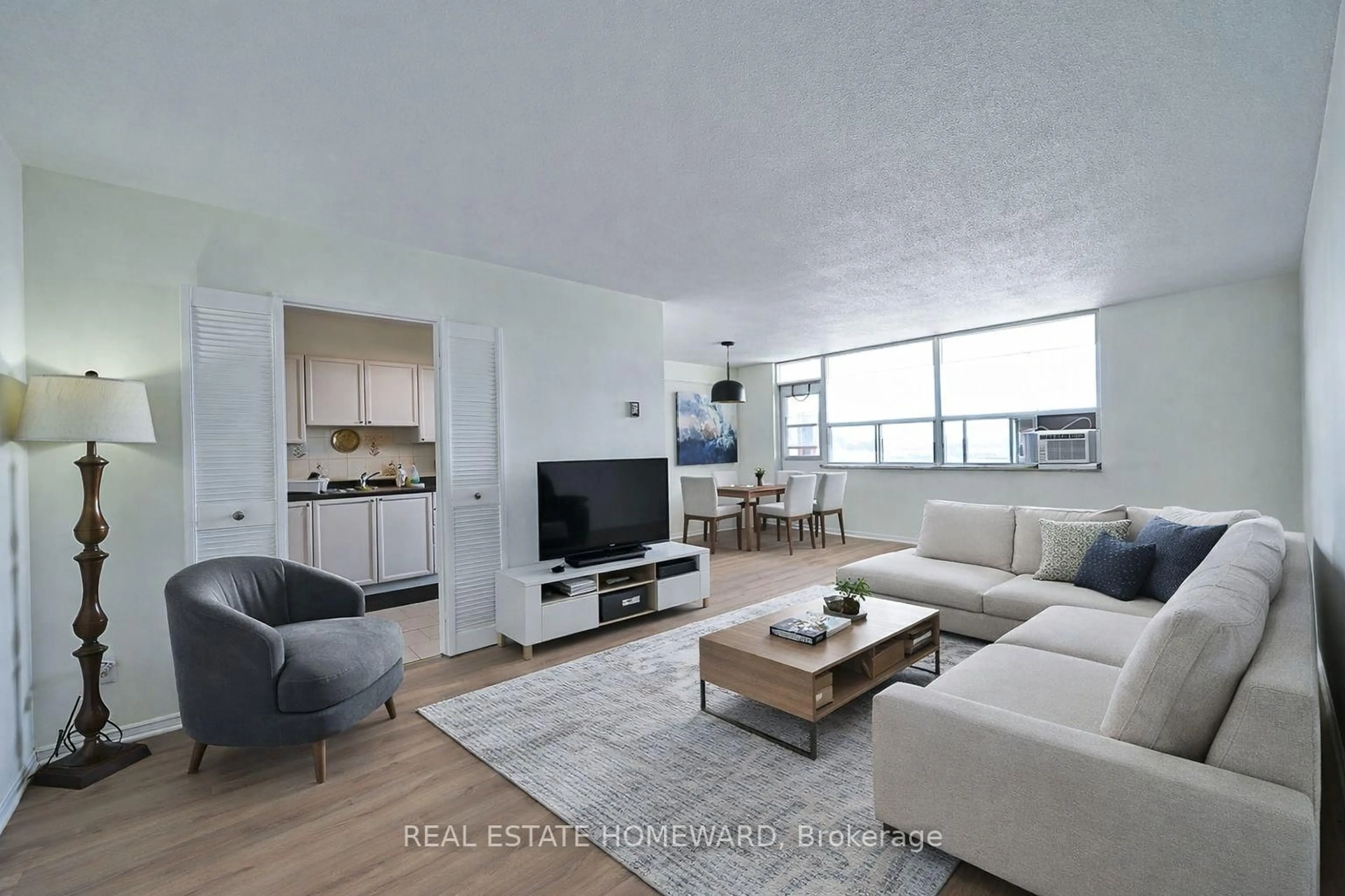 Living room with furniture, unknown for 2550 Pharmacy Ave #1015, Toronto Ontario M1W 1H9