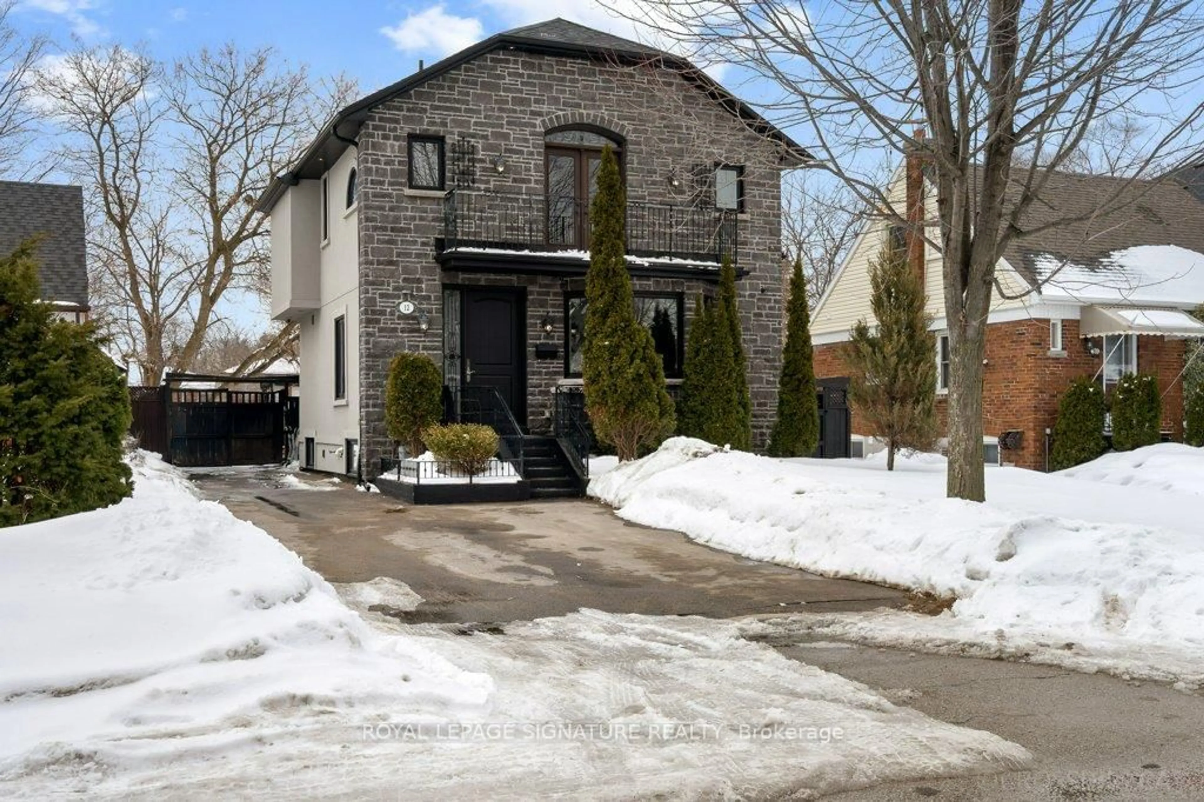 Home with brick exterior material, street for 12 Willowhurst Cres, Toronto Ontario M1R 3R6