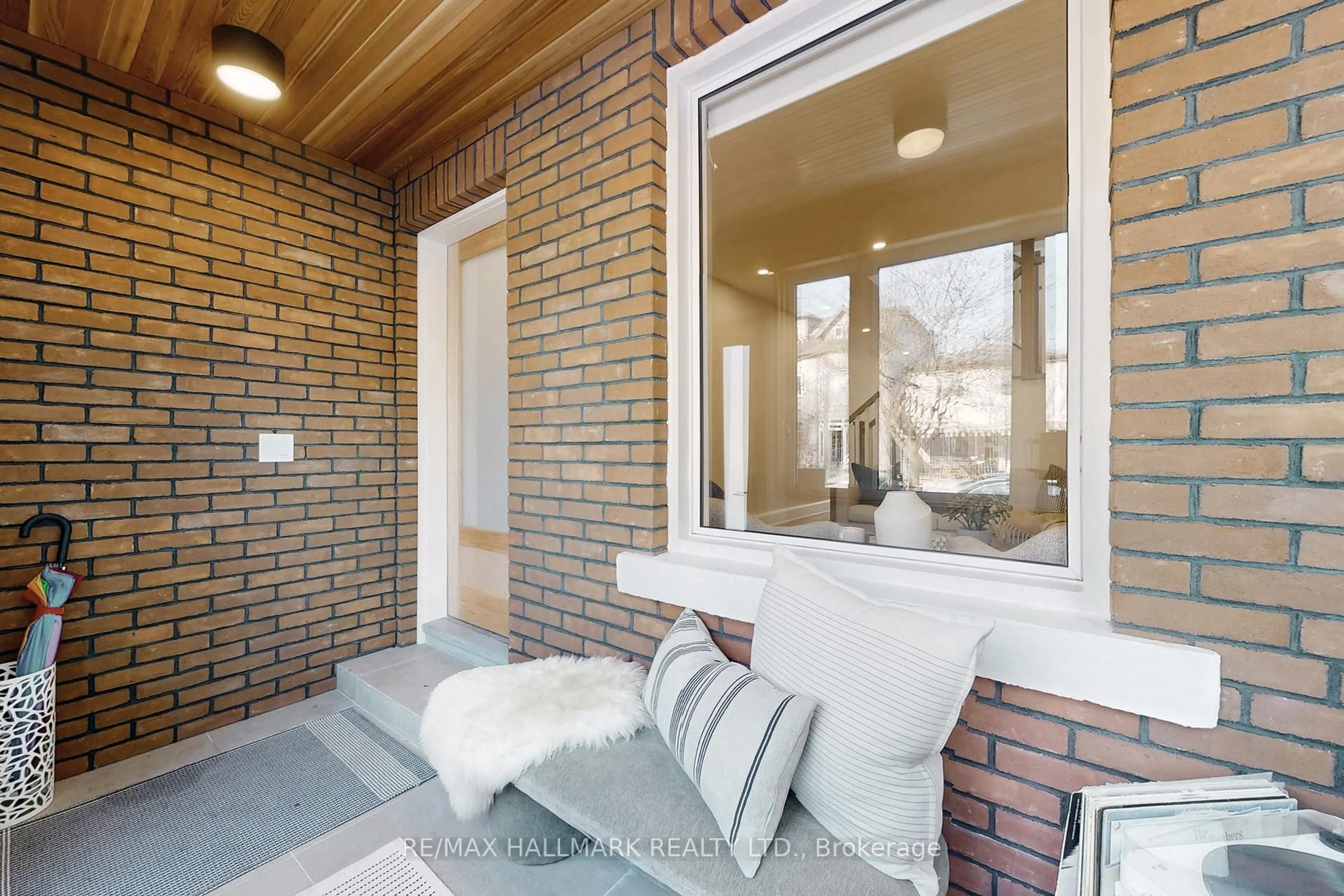 Home with brick exterior material, street for 72 Hastings Ave, Toronto Ontario M4L 2L2