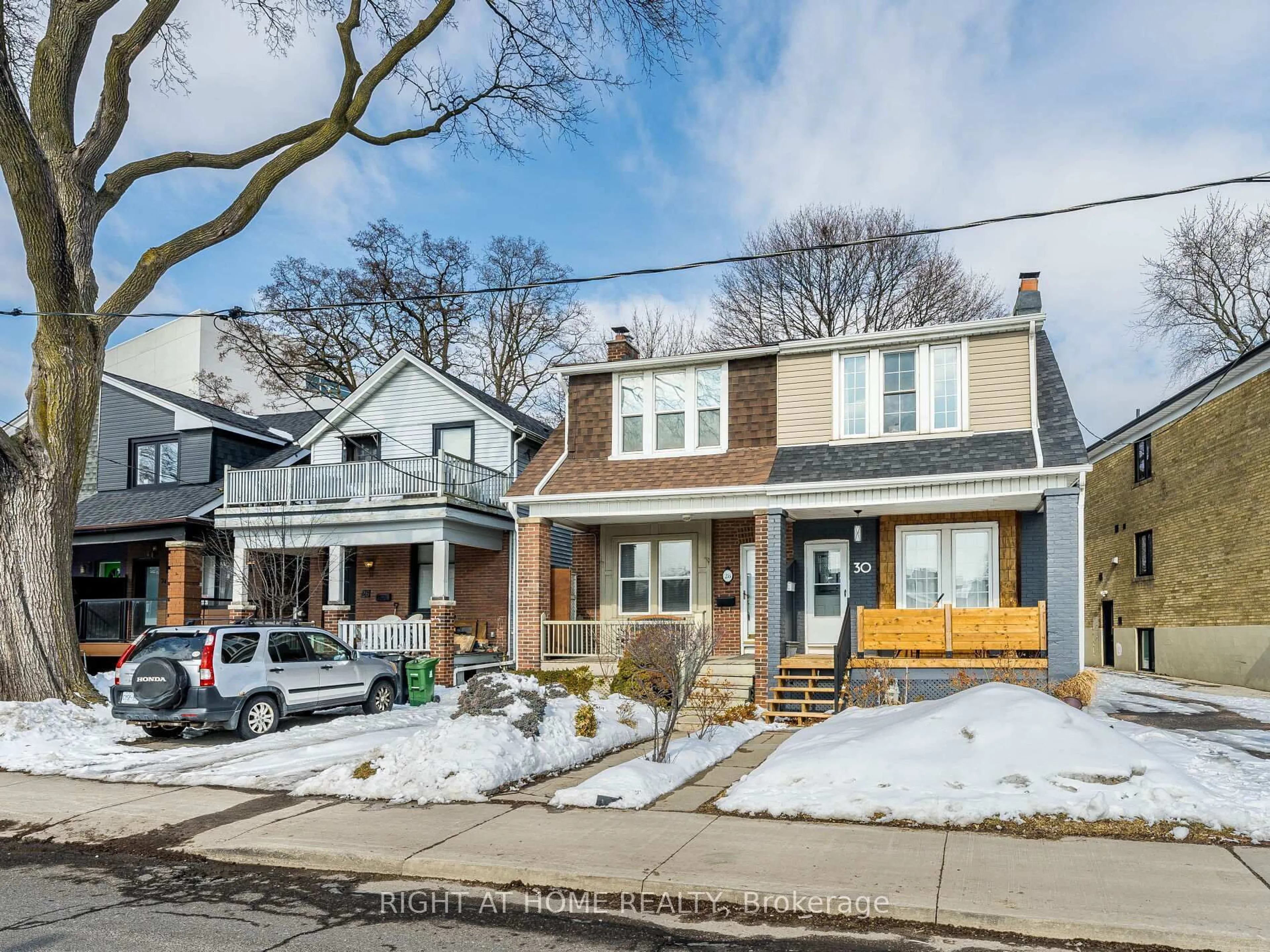 Home with brick exterior material, street for 28 Erindale Ave, Toronto Ontario M4K 1R9