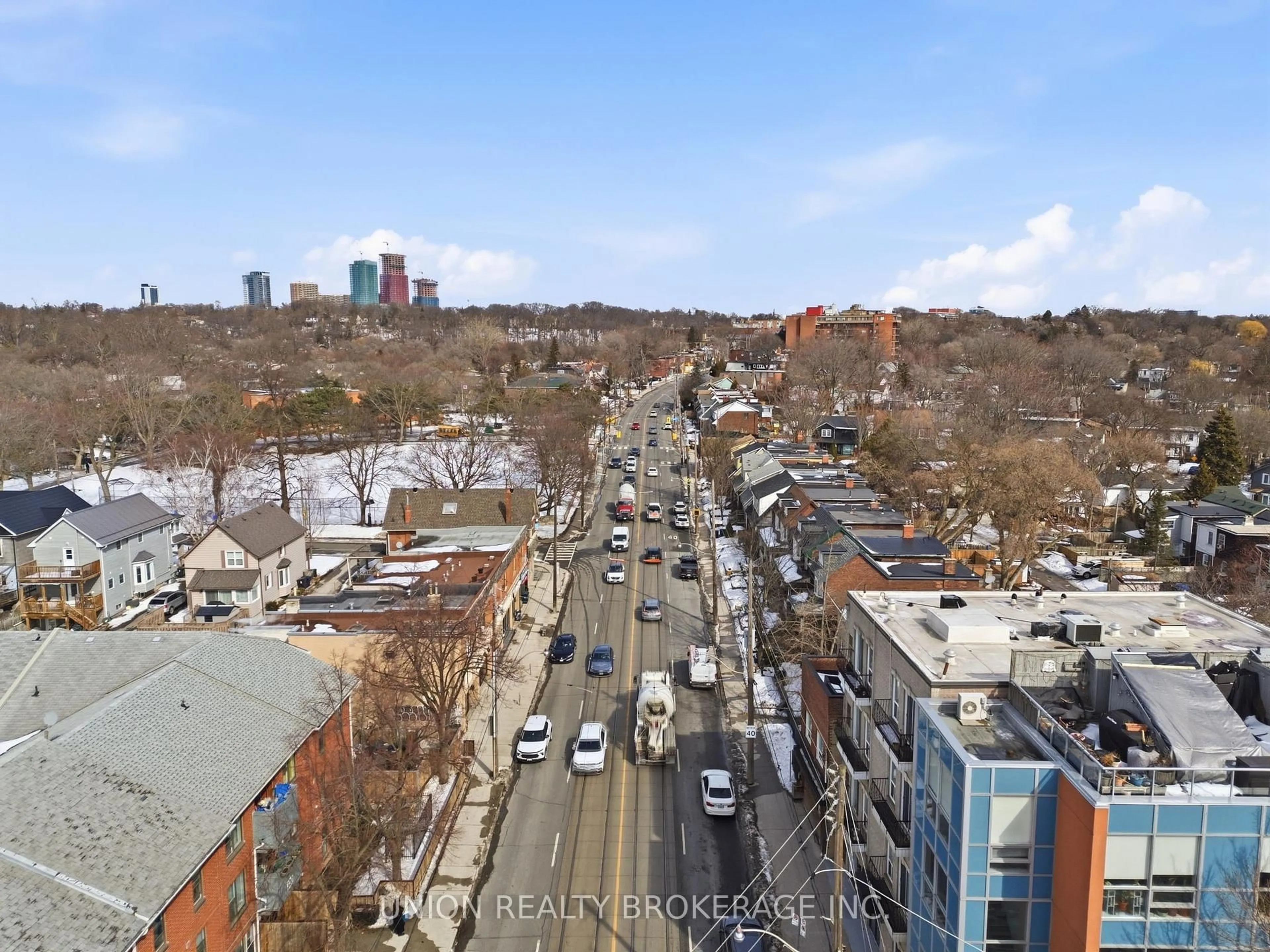 A pic from outside/outdoor area/front of a property/back of a property/a pic from drone, city buildings view from balcony for 293 Kingston Rd, Toronto Ontario M4L 1T6