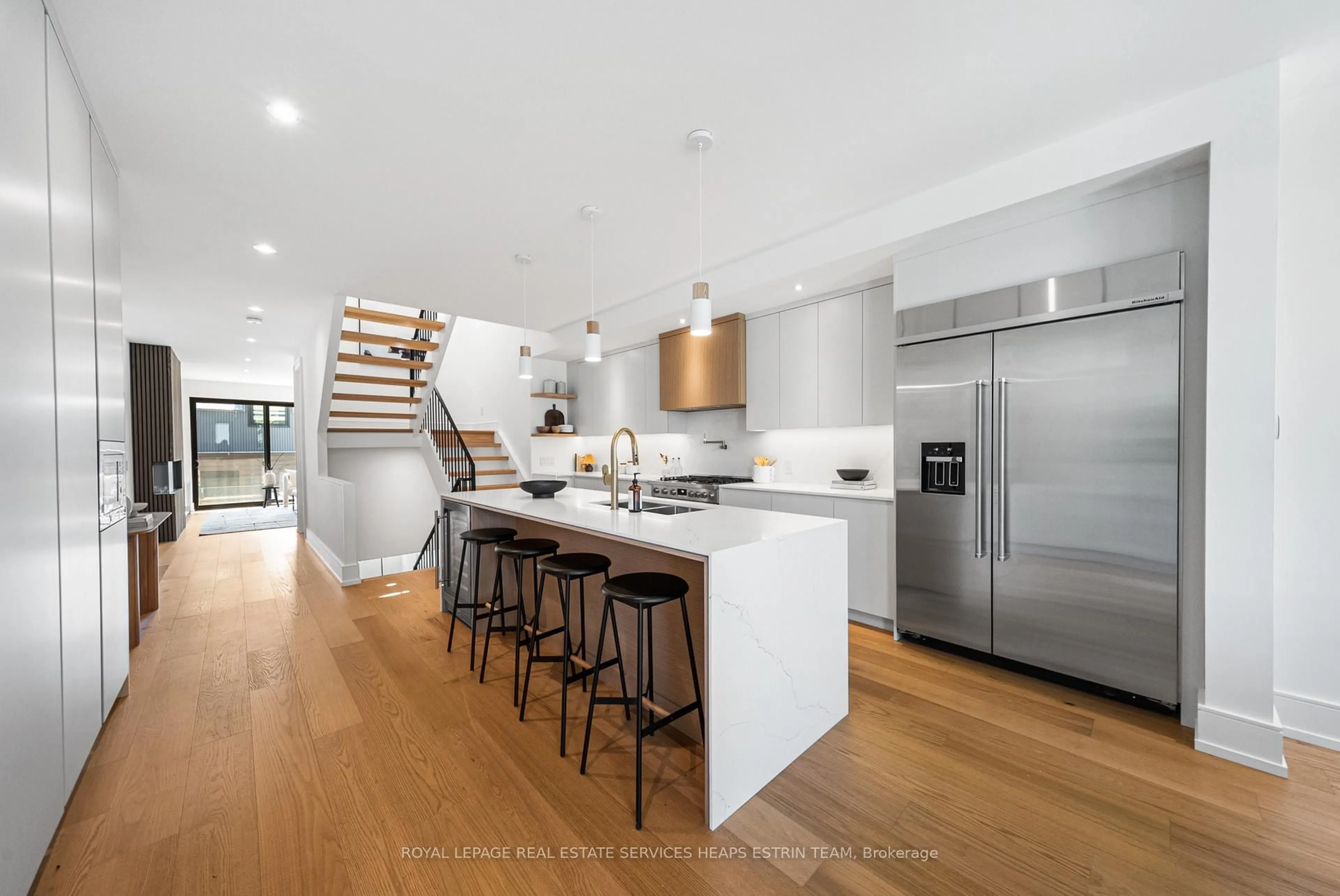 Open concept kitchen, wood/laminate floor for 17 Myrtle Ave, Toronto Ontario M4M 2A3