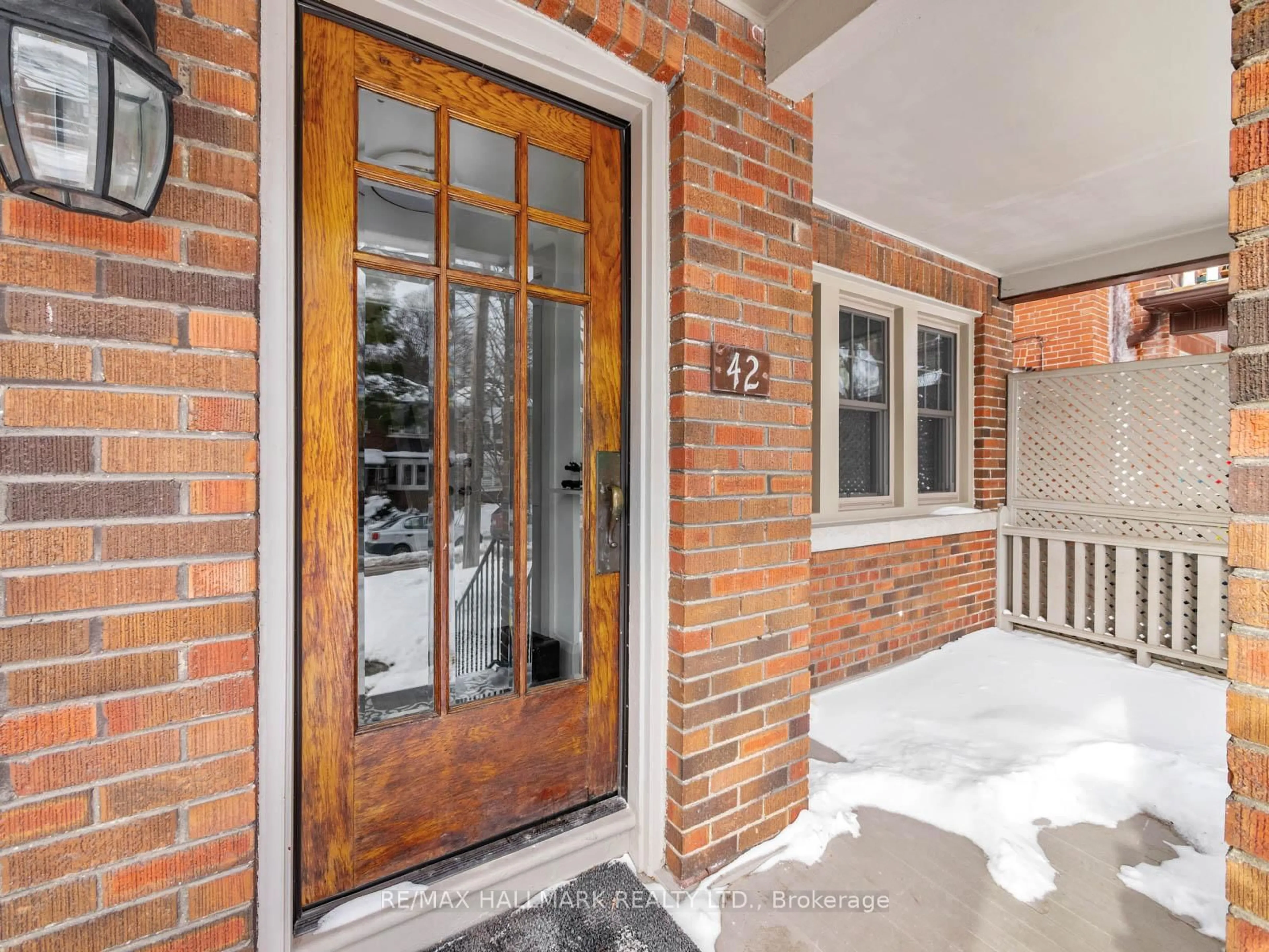 Home with brick exterior material, street for 42 Glen Manor Dr, Toronto Ontario M4E 2X2