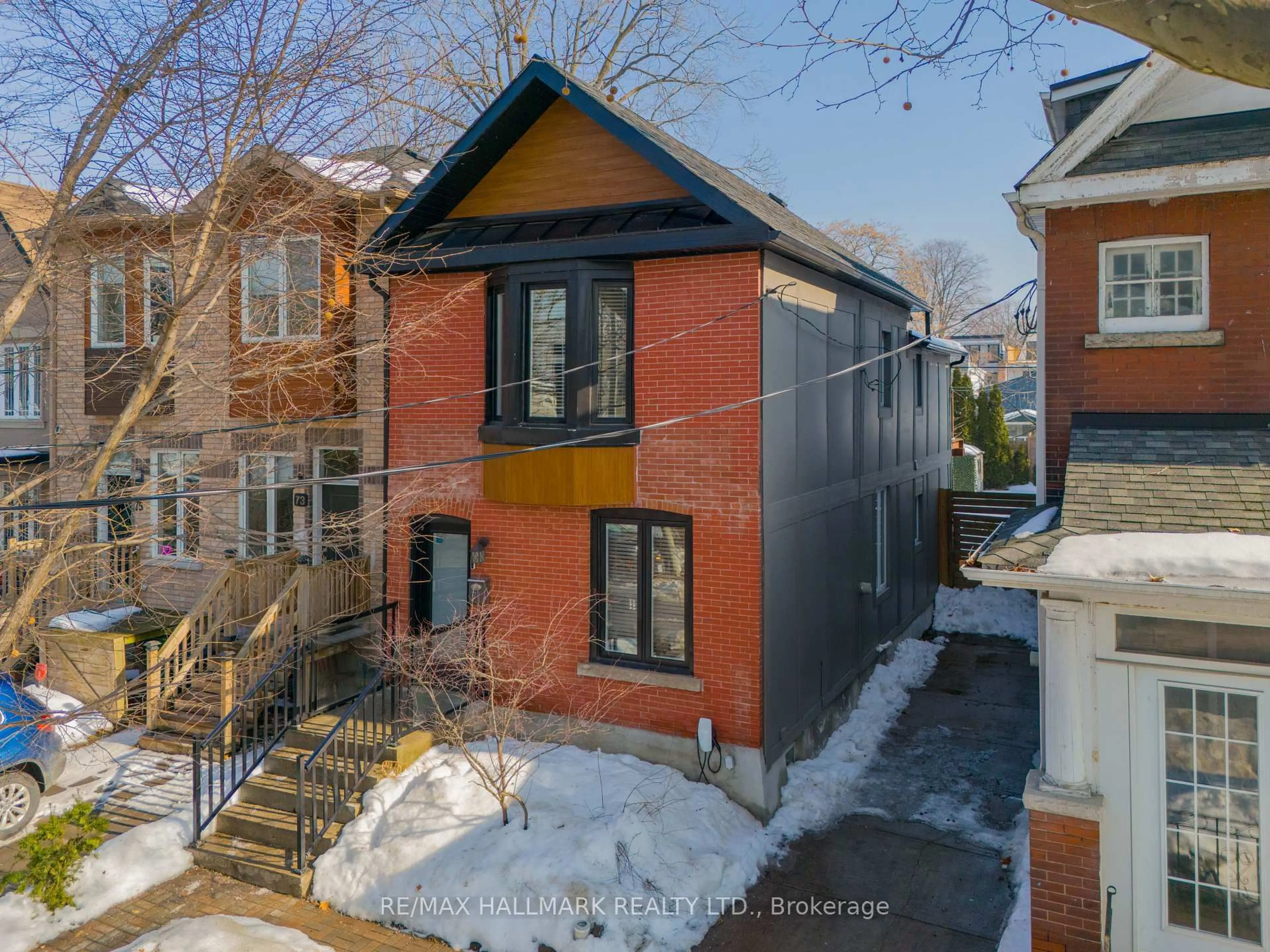 Home with brick exterior material, street for 71 Ashdale Ave, Toronto Ontario M4L 2Y6