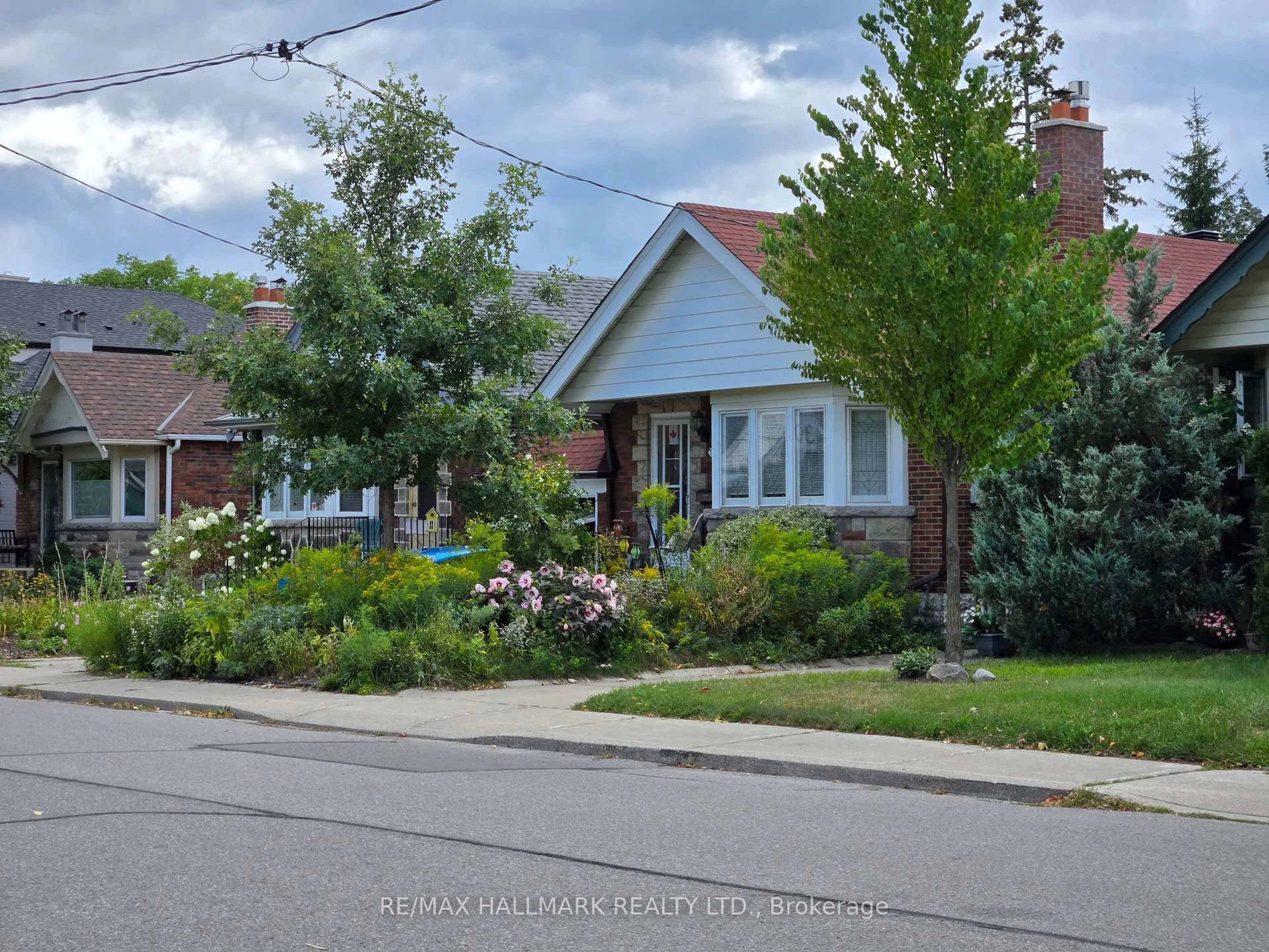 Home with brick exterior material, street for 18 Fairside Ave, Toronto Ontario M4C 3G9