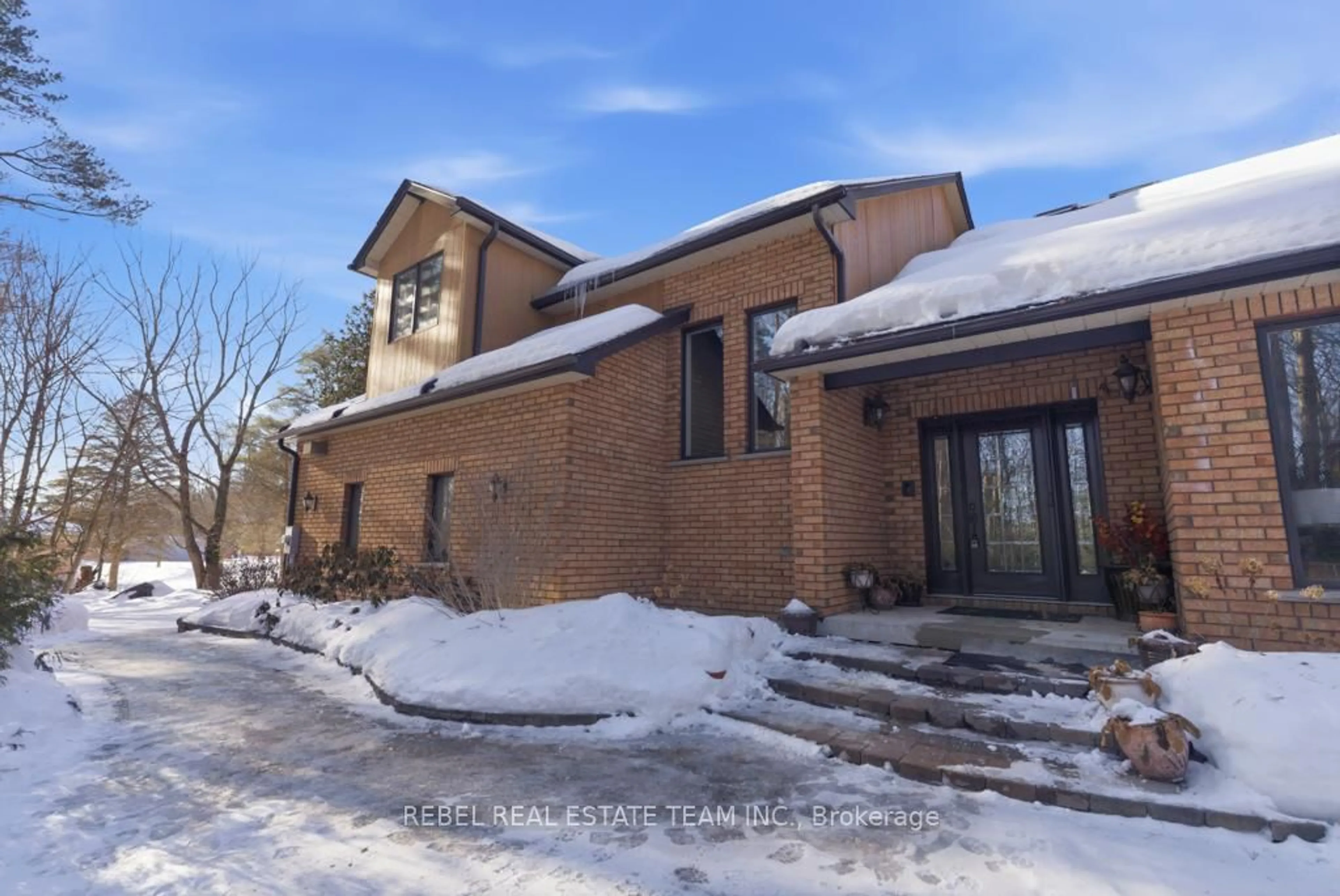 Home with brick exterior material, street for 21 Stone Sound, Scugog Ontario L9L 1P5