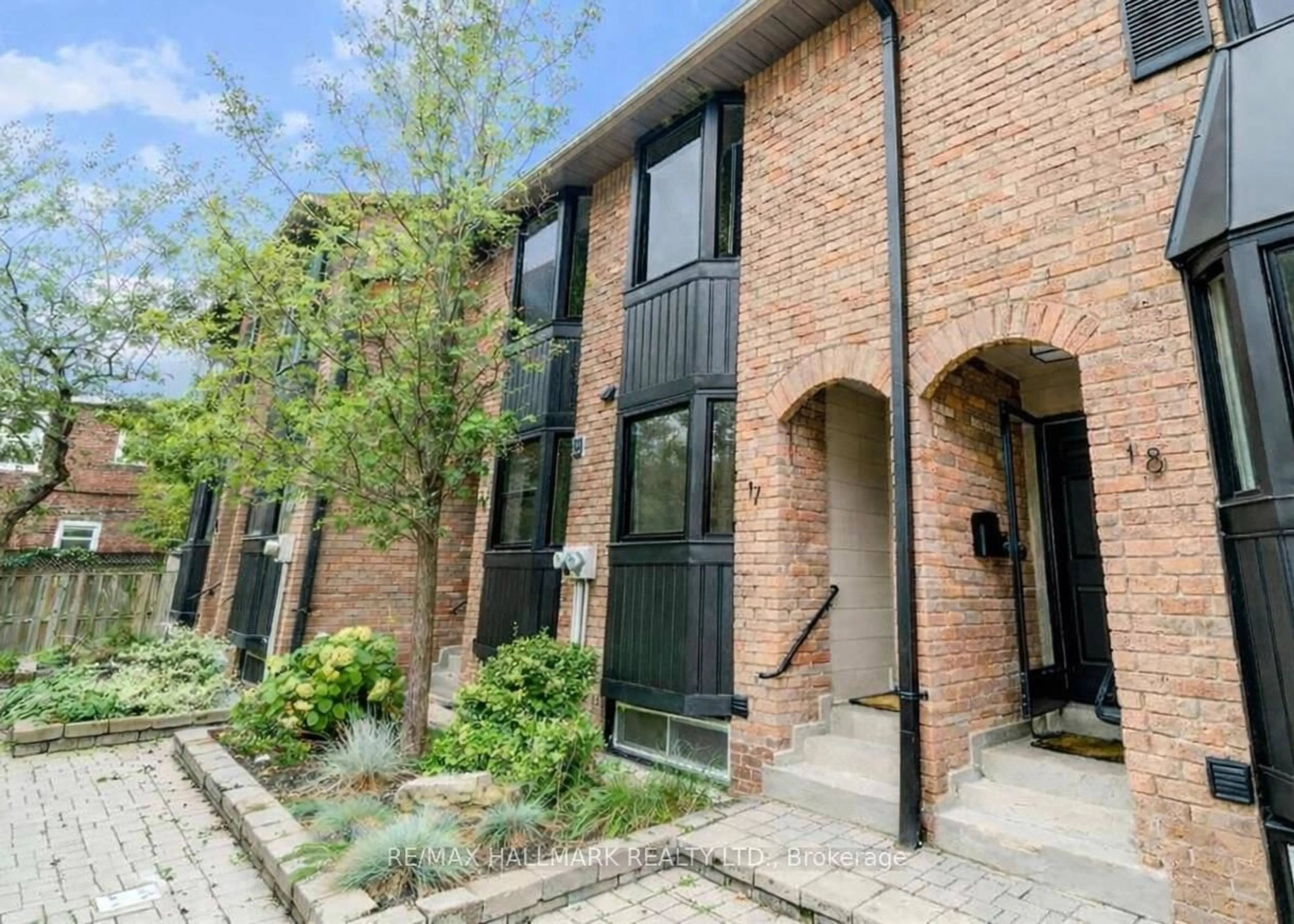 Home with brick exterior material, street for 13 Kerr Rd #17, Toronto Ontario M4L 1K2