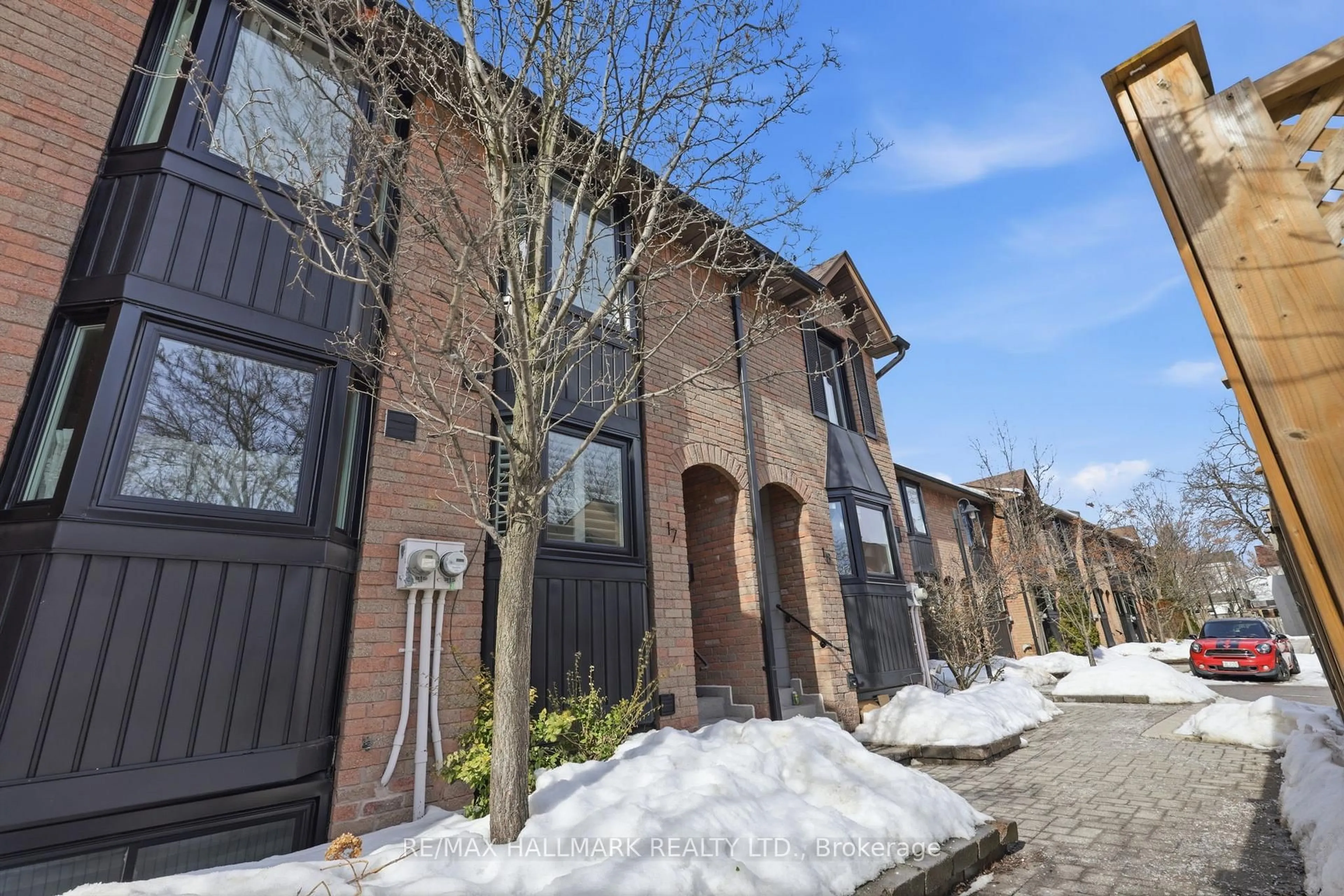 Home with brick exterior material, street for 13 Kerr Rd #17, Toronto Ontario M4L 1K2