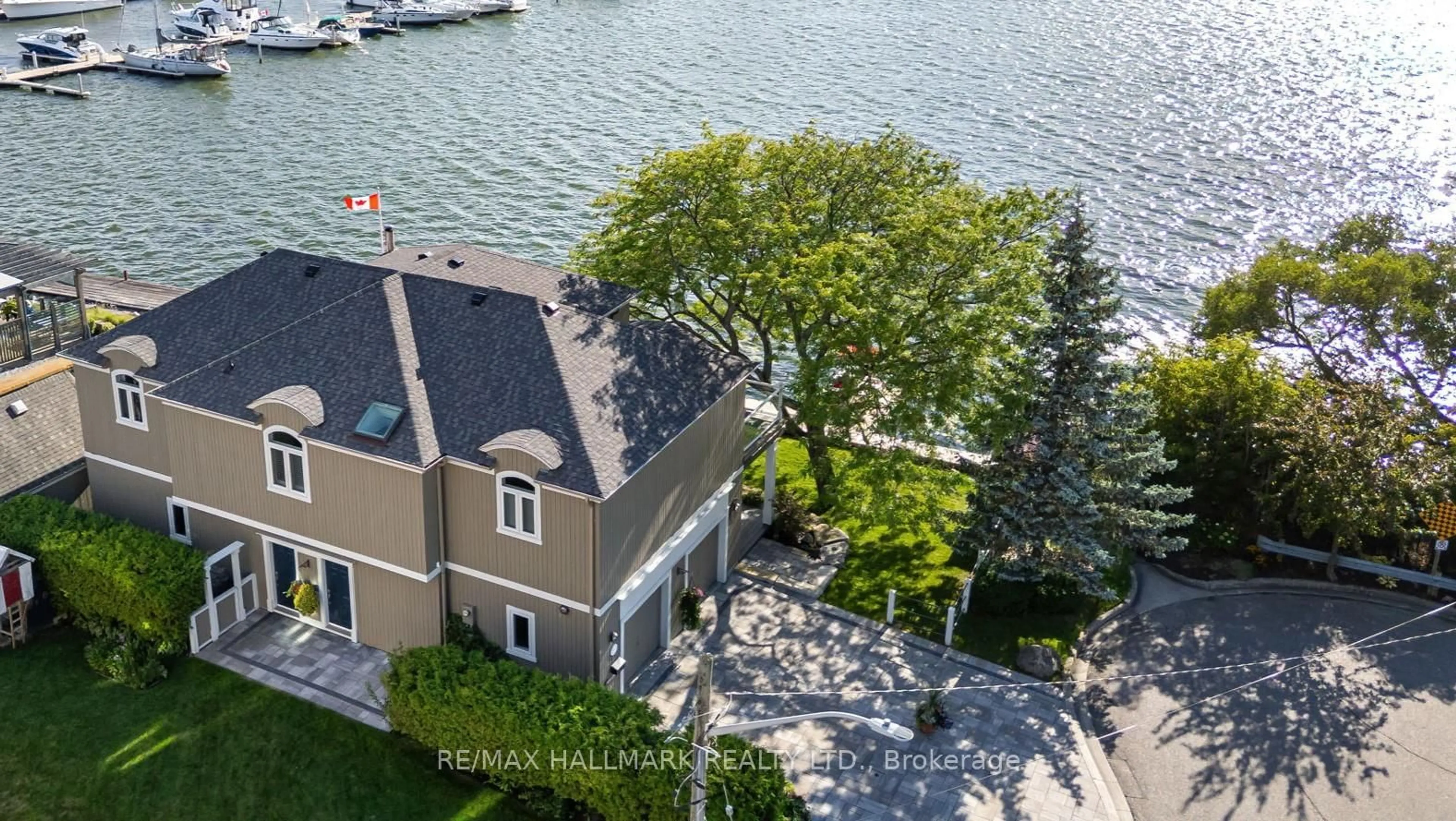 A pic from outside/outdoor area/front of a property/back of a property/a pic from drone, water/lake/river/ocean view for 1275 Wharf St, Pickering Ontario L1W 1A2